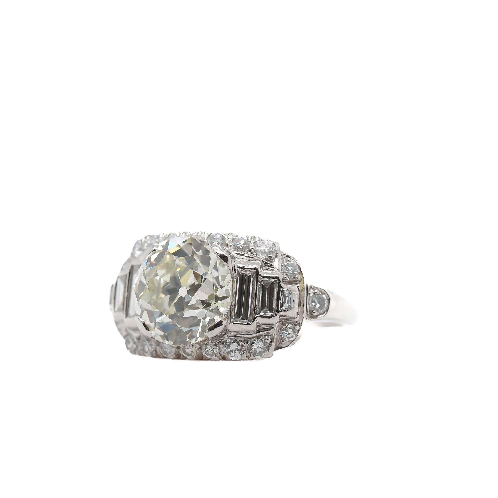 Year: 1930s

Item Details:
Ring Size: 6.5
Metal Type: Platinum [Hallmarked, and Tested]
Weight: 7.3 grams

Center Diamond Details:

GIA Report#:2235470194
Weight: 3.27ct total weight
Cut: Old European brilliant
Color: OP
Clarity: VS1
Type: