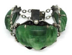 Circa 1930s Sterling Silver and Carved Green Onyx Mask Bracelet