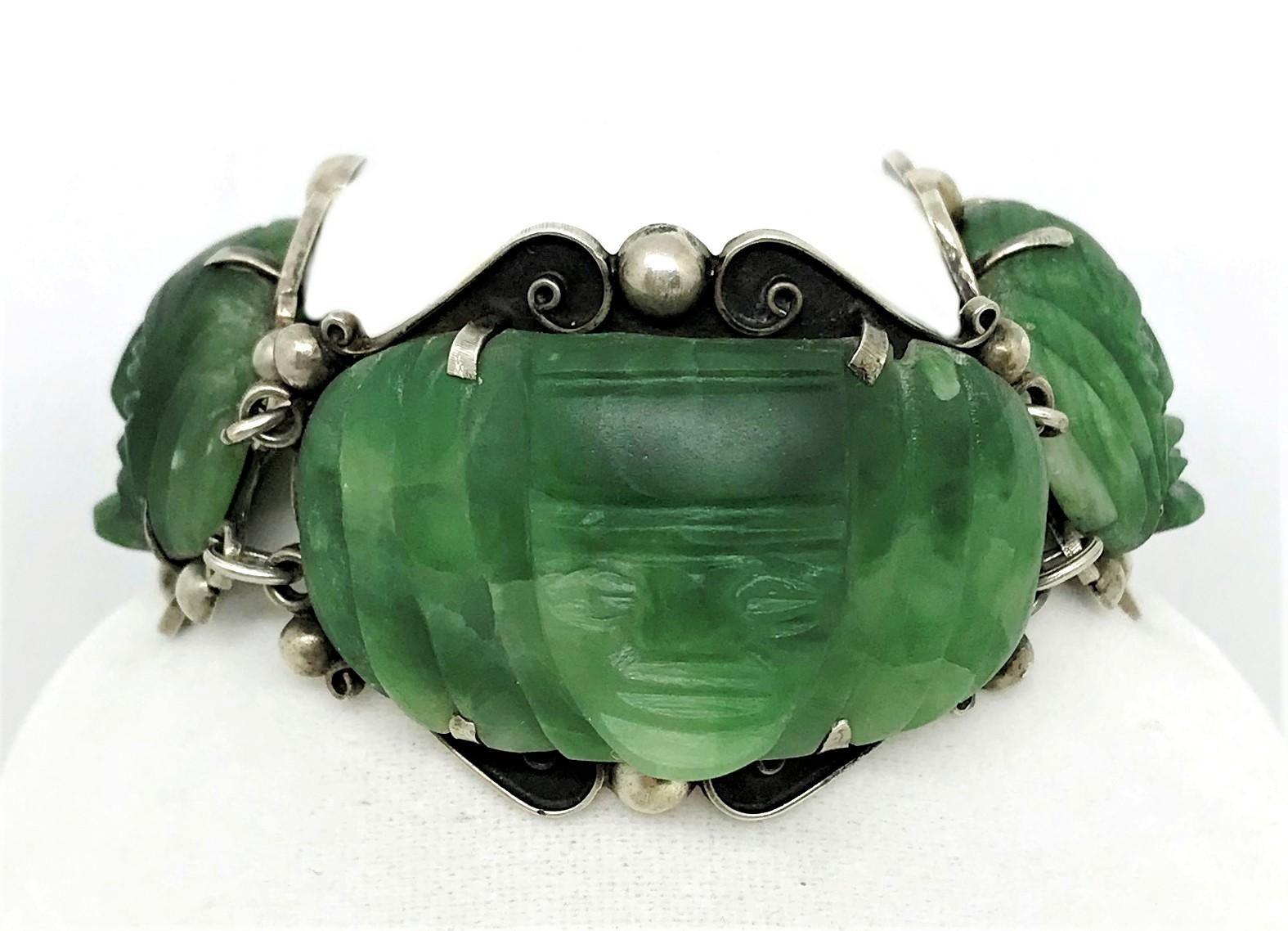 Circa 1930s Sterling Silver and Carved Green Onyx Mask Bracelet In Good Condition For Sale In Long Beach, CA