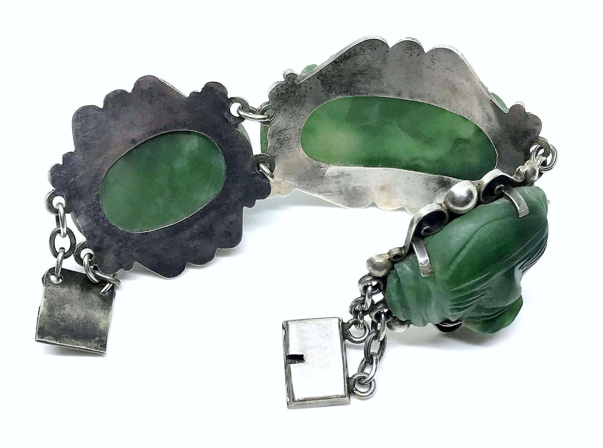 Circa 1930s Sterling Silver and Carved Green Onyx Mask Bracelet For Sale 1