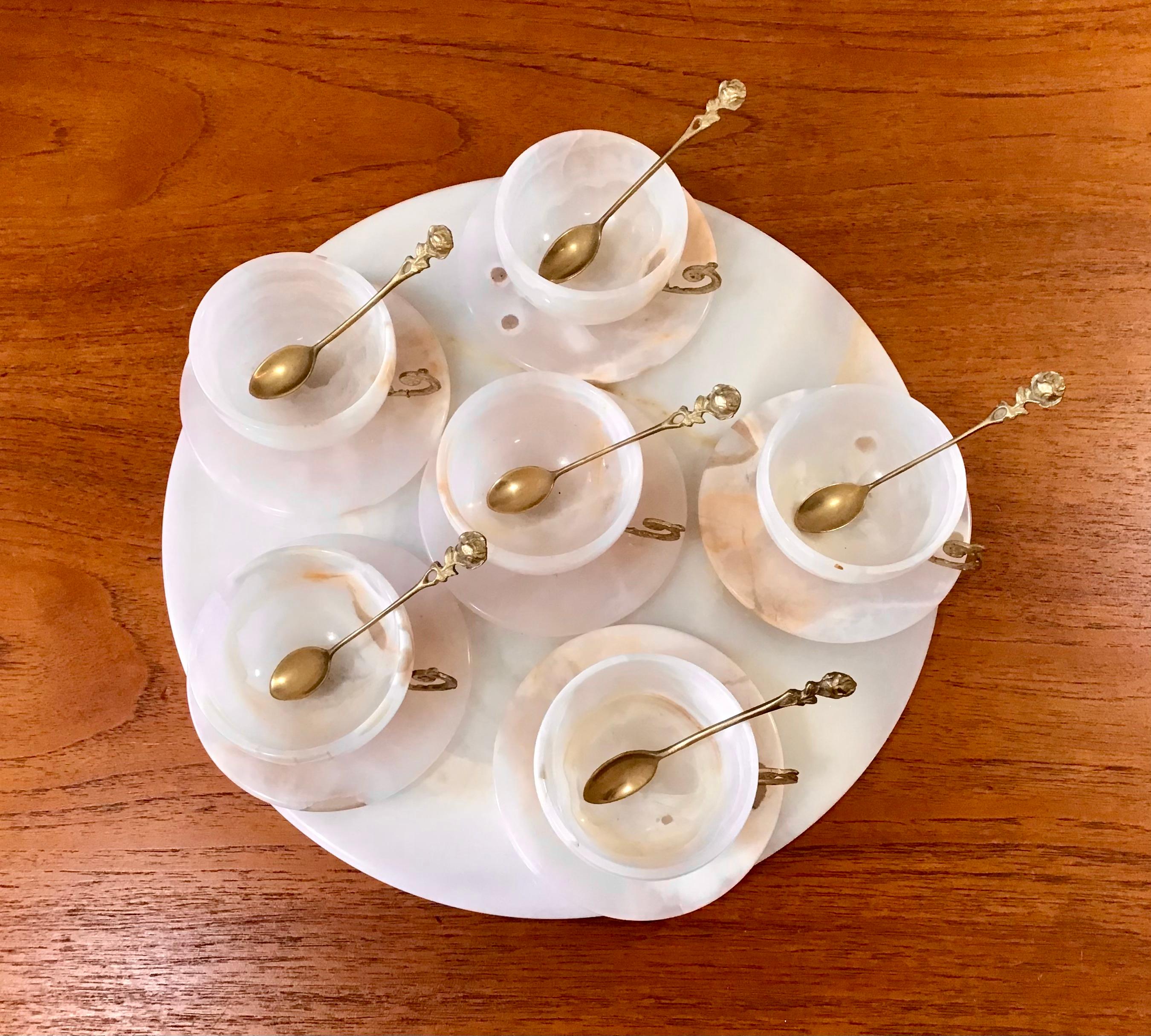 RARE vintage white agate tray and set of 6 tea cups, saucers, and gold spoons with delicate roses on the end, most likely from the 1930s. Includes 19 pieces total.

Tray measures 12.75