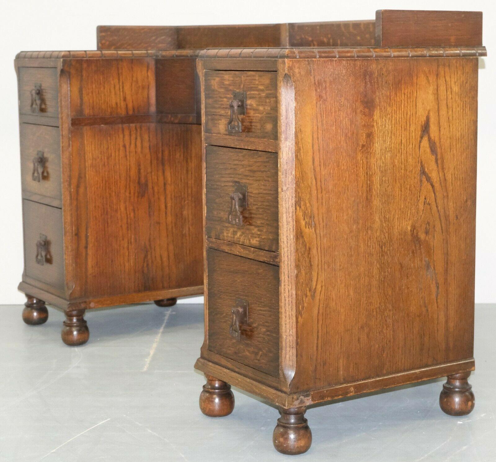 English Circa 1930's Waring & Gillow Ltd Lancaster Oak Desk on Bun Legs & Seven Drawers For Sale