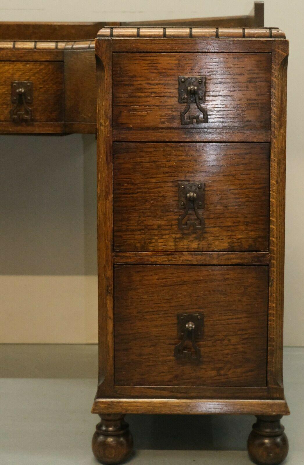Circa 1930's Waring & Gillow Ltd Lancaster Oak Desk on Bun Legs & Seven Drawers For Sale 1