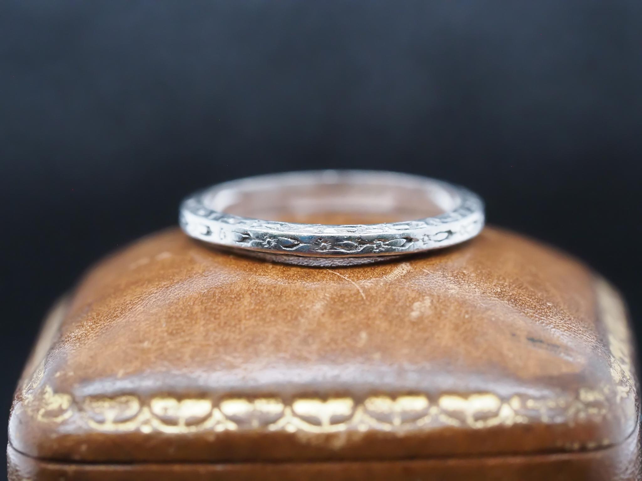 Year: 1931 (Engraved on inner shank)
Maker: Orange Blossom
Item Details:
Ring Size: 5.25 (Sizable)
Metal Type: Platinum  [Hallmarked, and Tested]
Weight:2.5  grams
Band Width: 2.1
Condition:  Excellent