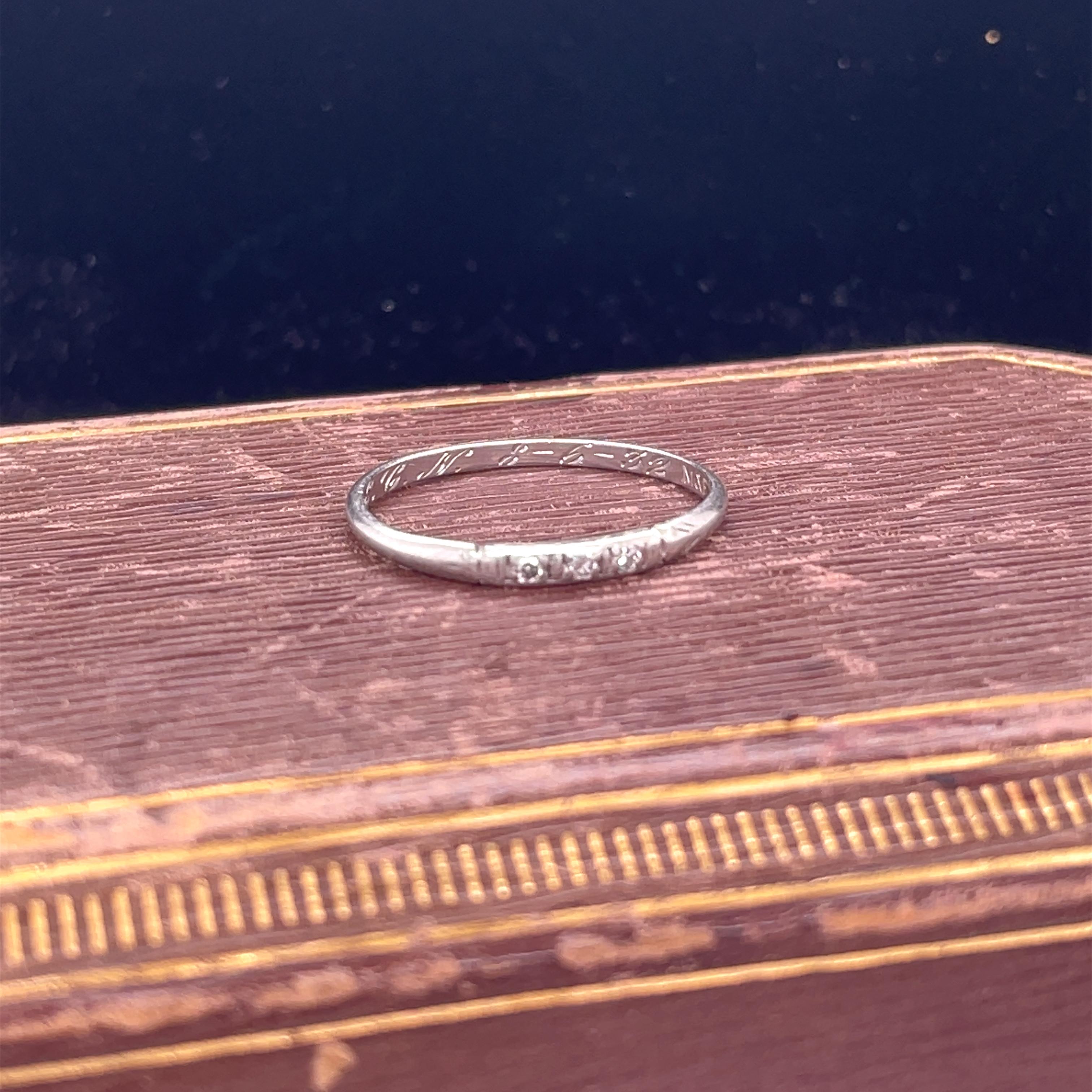 Year: 1932 (Engraved Inside with Date: 8-6-32)

Item Details: 
Ring Size: 7
Metal Type: Platinum  [Hallmarked, and Tested]
Weight:  1.6 grams

Diamond Details:
Weight: .06ct, total weight
Cut: Old European brilliant
Color: G
Clarity: VS

Finger to