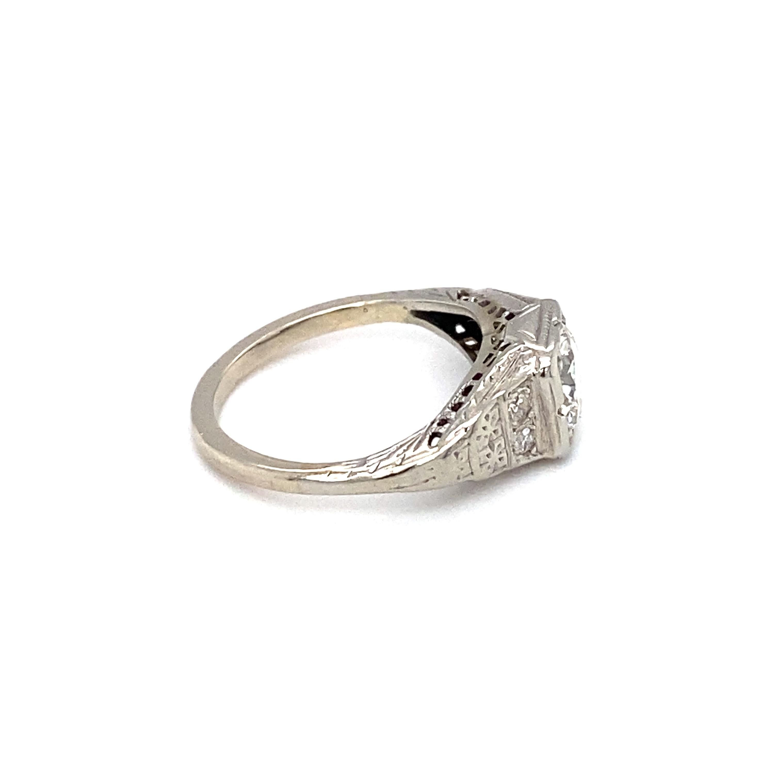 Item Details: This elegant vintage ring has a center diamond at 0.85 carats with accent diamonds on the sides.

Circa: 1940s
Metal Type: Platinum and 14k white gold
Weight: 2.4g
Size: US 4.25, resizable

Diamond Details:

Carat: 0.85 carat