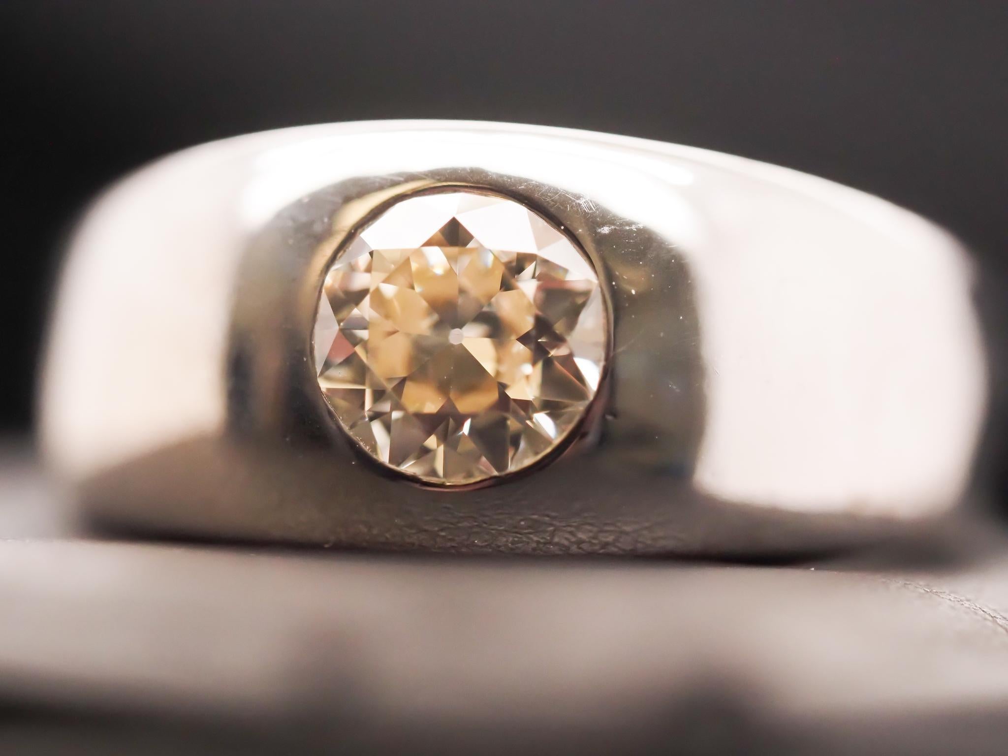 Year: 1940s
Item Details:
Ring Size: 11 (Sizable)
Metal Type: 14K White Gold [Hallmarked, and Tested]
Weight: 12.5grams
Diamond Details: 1.35ct, Old European Brilliant, Light Yellow (S/T Color), VS1 Clarity
Band Width: 4.68mm
Condition: