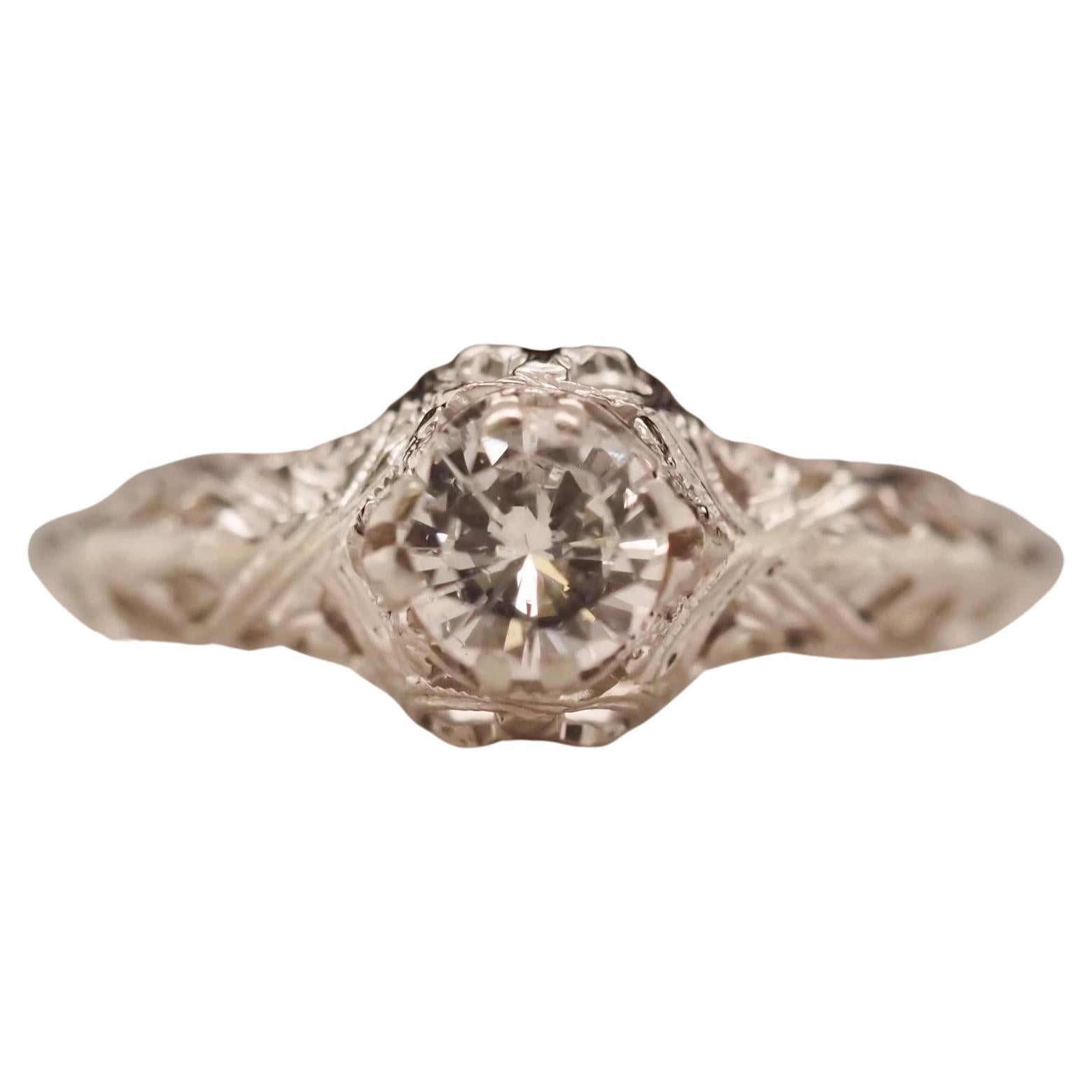 Circa 1940s Art Deco Filigree .53ct Round Brilliant Diamond Ring For Sale