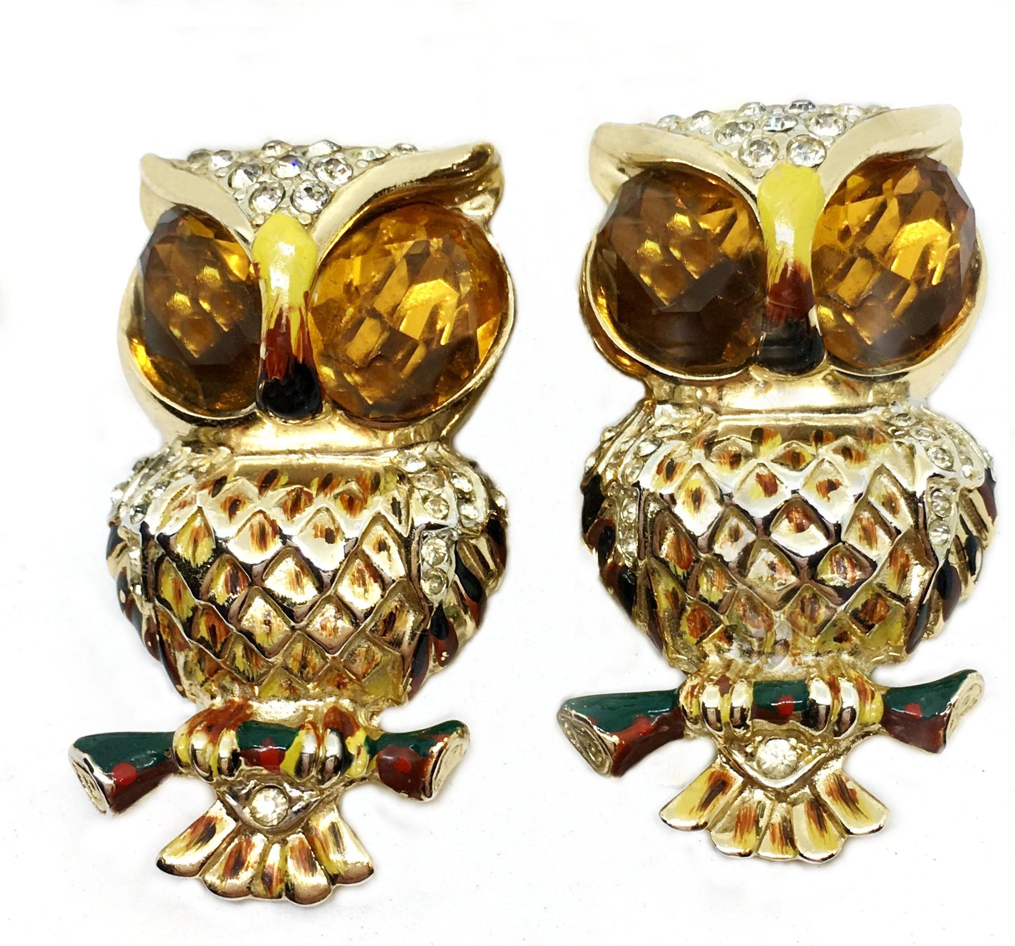 1940s Coro Craft Duette gold tone metal owl brooch/clips set with large topaz faceted glass eyes and embellished with yellow and brown enameling.  These iconic pieces were designed by Adolph Katz, Coro's head designer for many years, and have a 1944