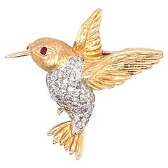 Circa 1940s Diamond Hummingbird Brooch in 14 Karat Two Tone Gold