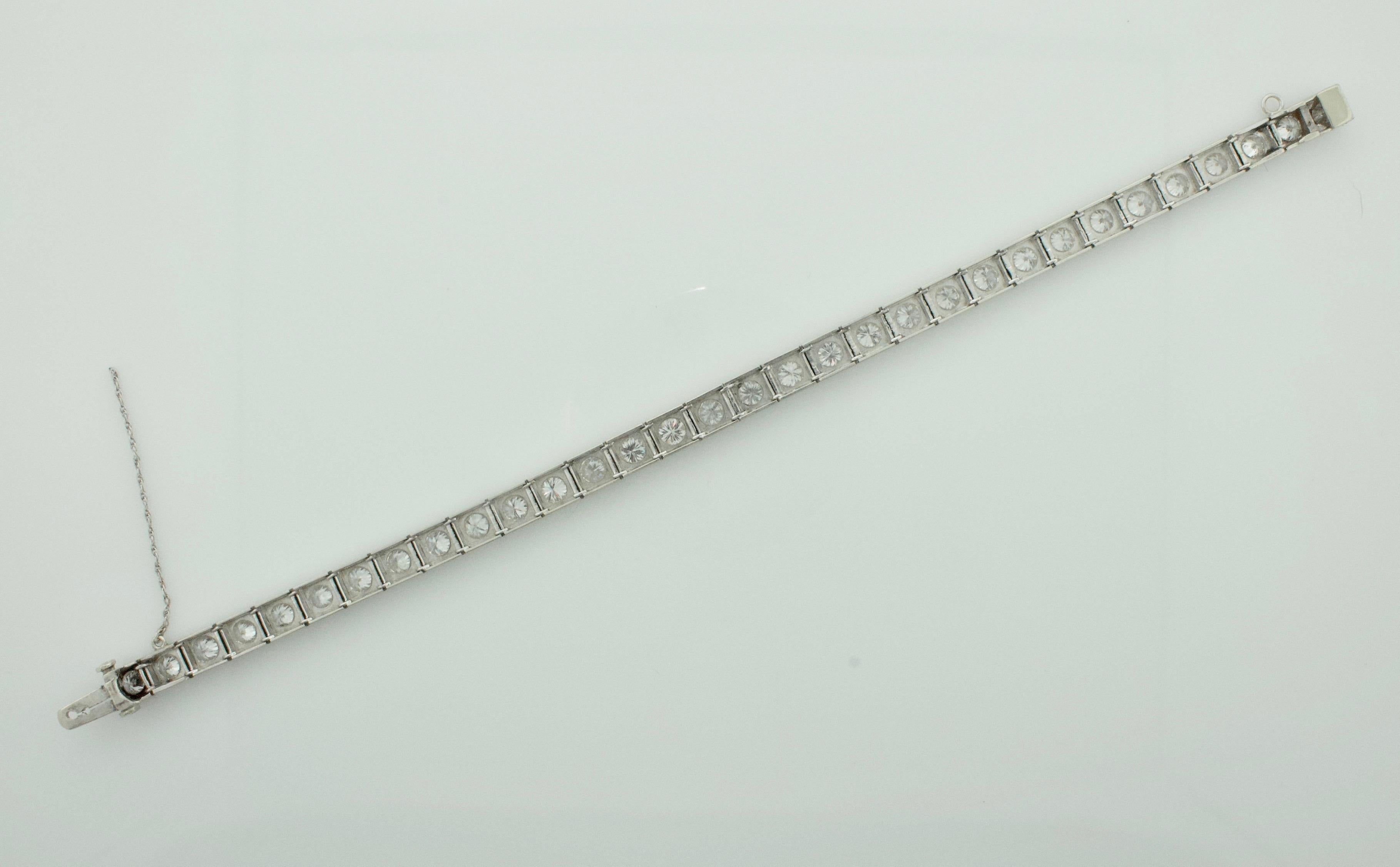 Round Cut Diamond Tennis Bracelet in White Gold 6.50 Carat, circa 1940s For Sale