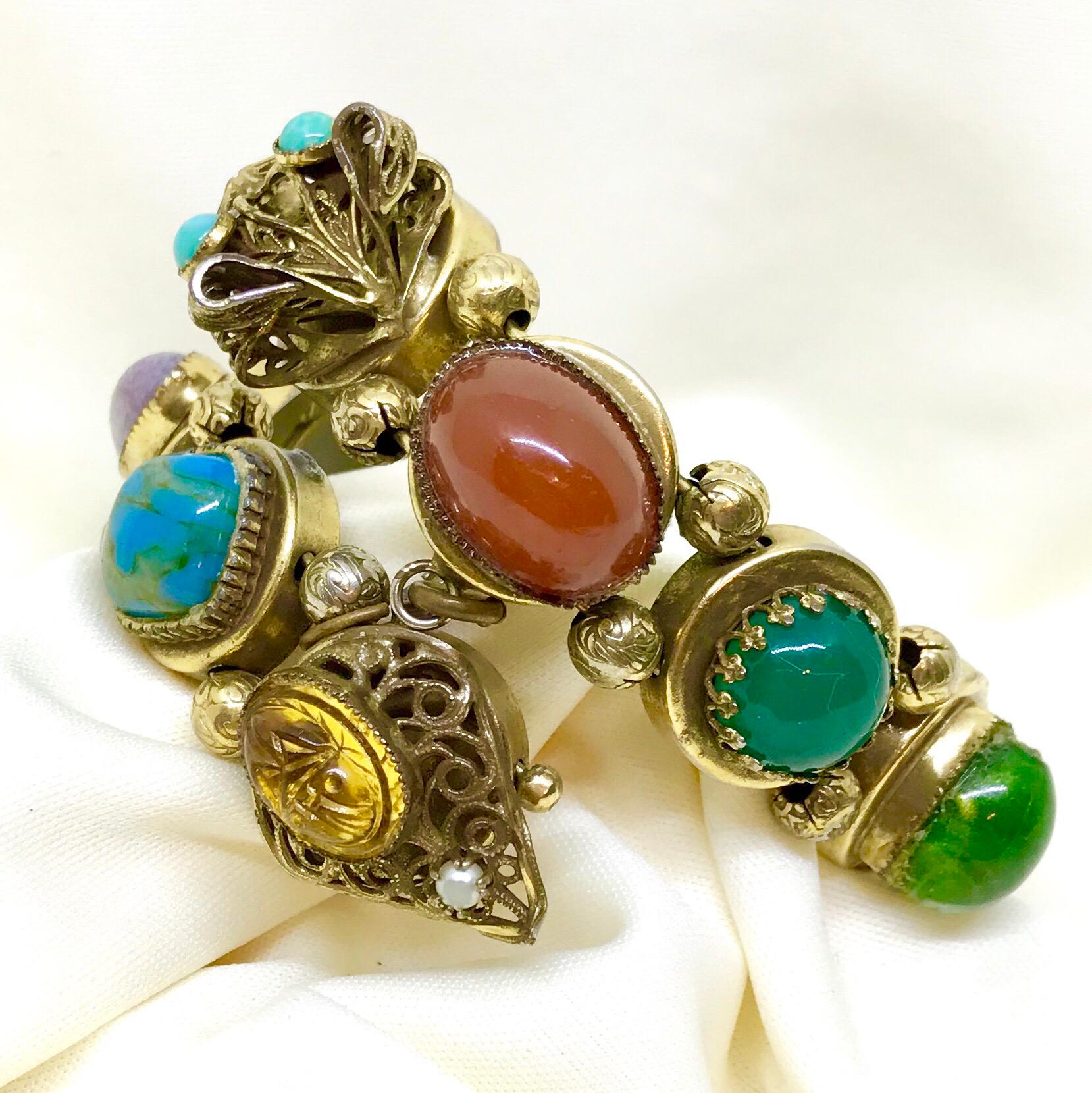 Circa 1940s Jewel Tone Glass Cabochon Wrap Bracelet With Snake Motif In Good Condition In Long Beach, CA