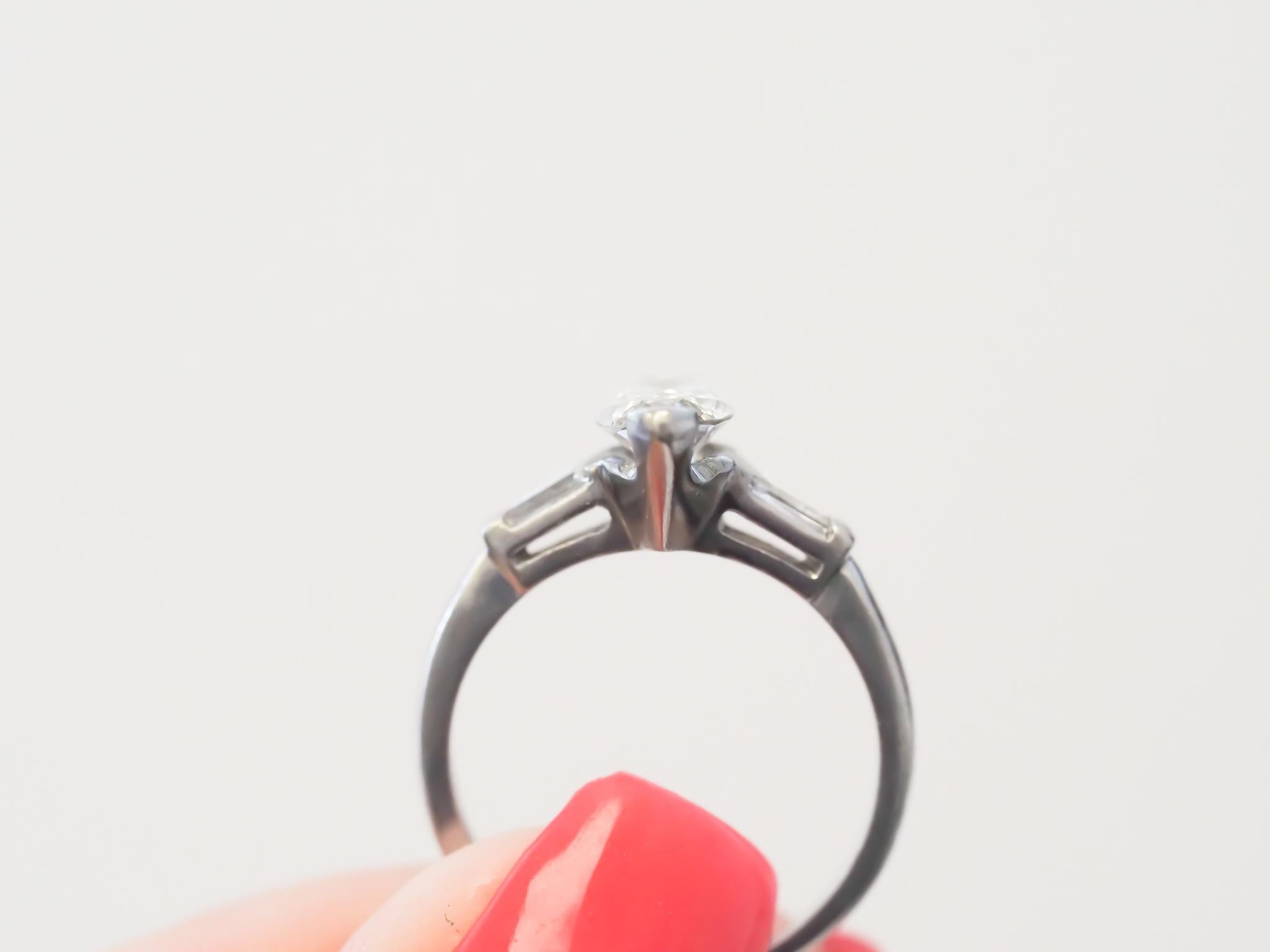 Women's Circa 1940s Platinum Antique Moval 1.21ct GIA Diamond Engagement Ring For Sale