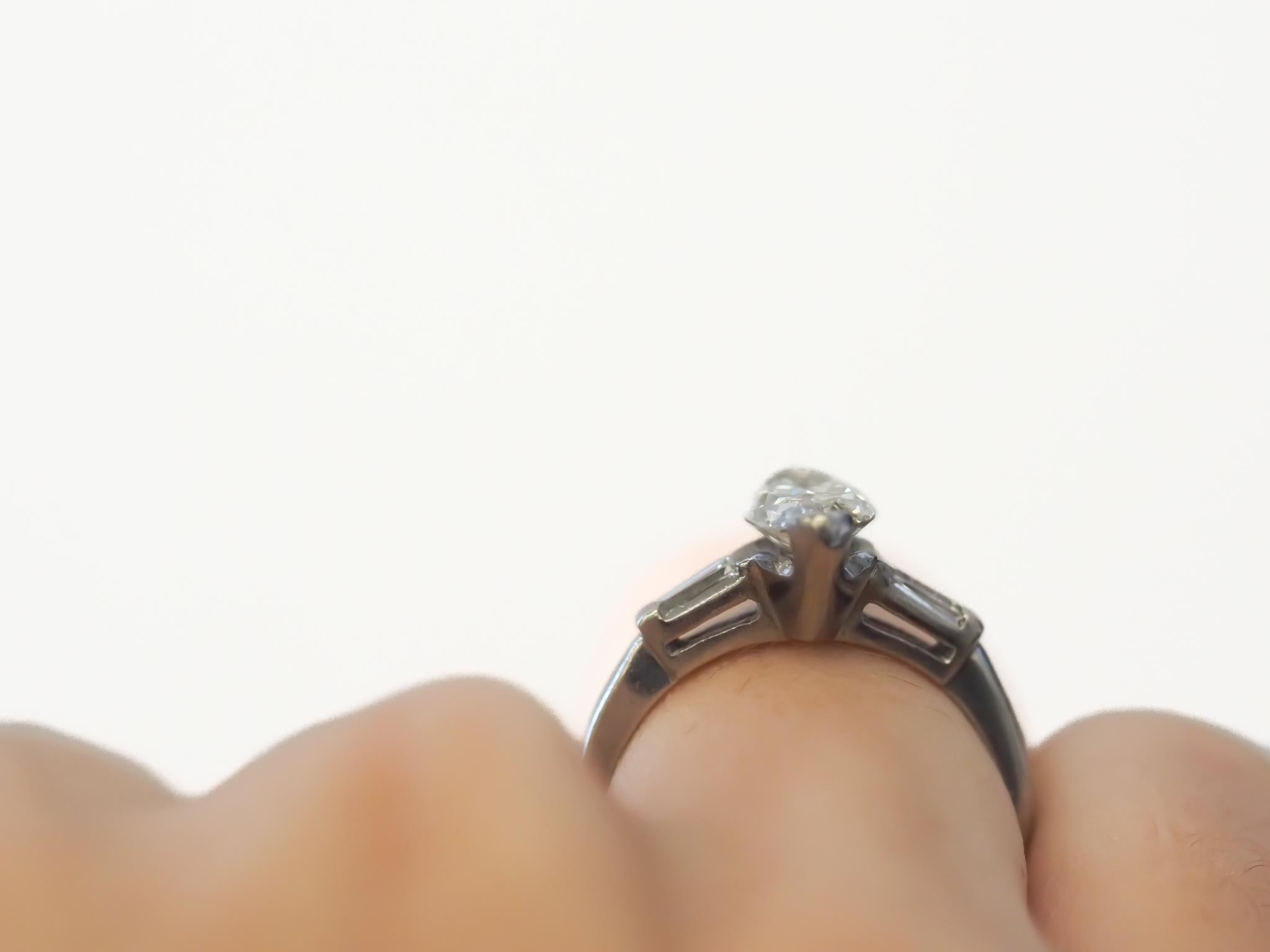 Circa 1940s Platinum Antique Moval 1.21ct GIA Diamond Engagement Ring For Sale 1