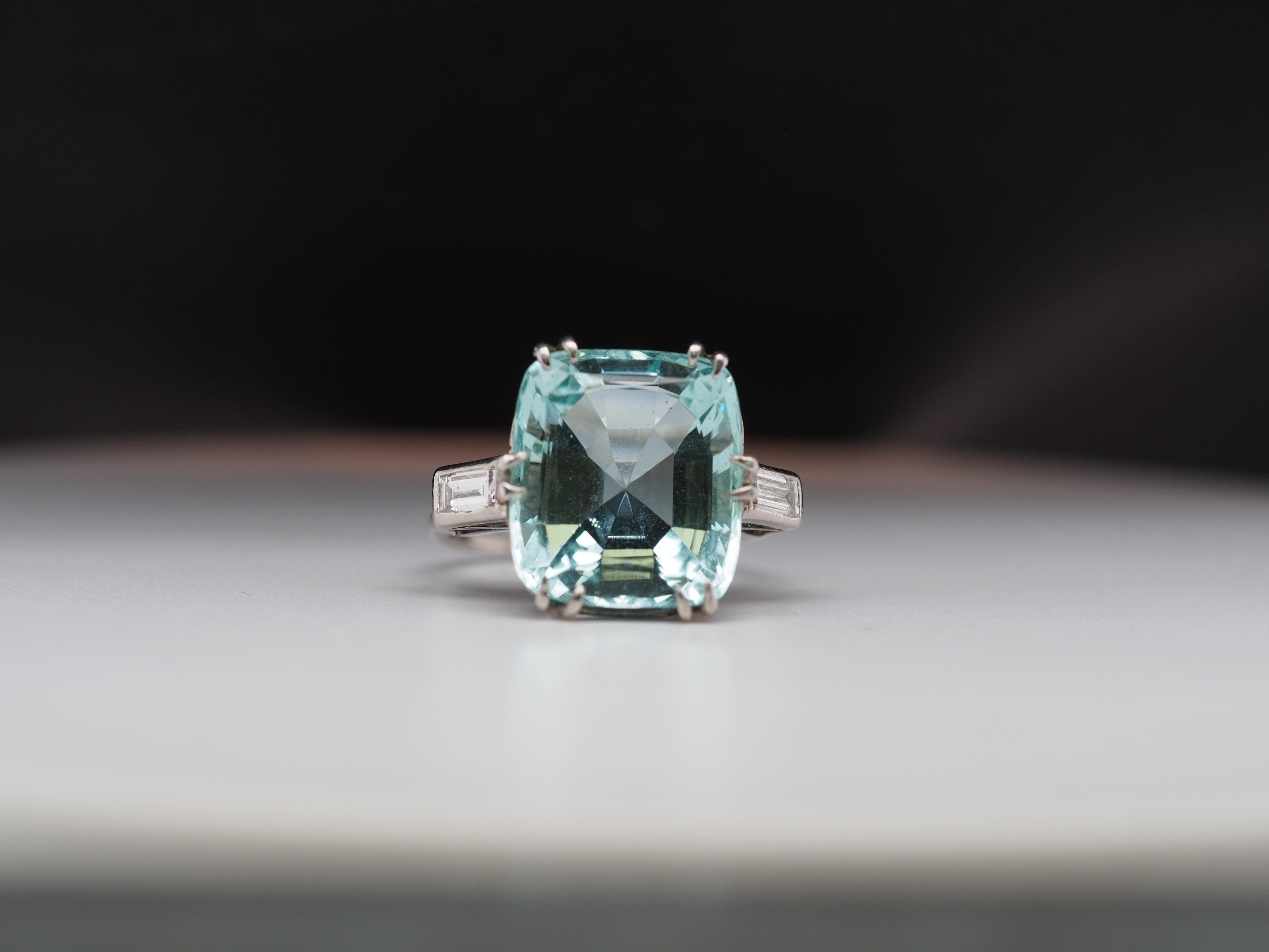 Item Details:
Ring Size: 8
Metal Type: Platinum  [Hallmarked, and Tested]
Weight: 7.7  grams

Aquamarine Details:
Measurement: 25.5 x 23mm
Weight: 10.00ct Approximate

Diamond Details:
Straight step cut, .30ct, total weight, F Color, VS Clarity
Band