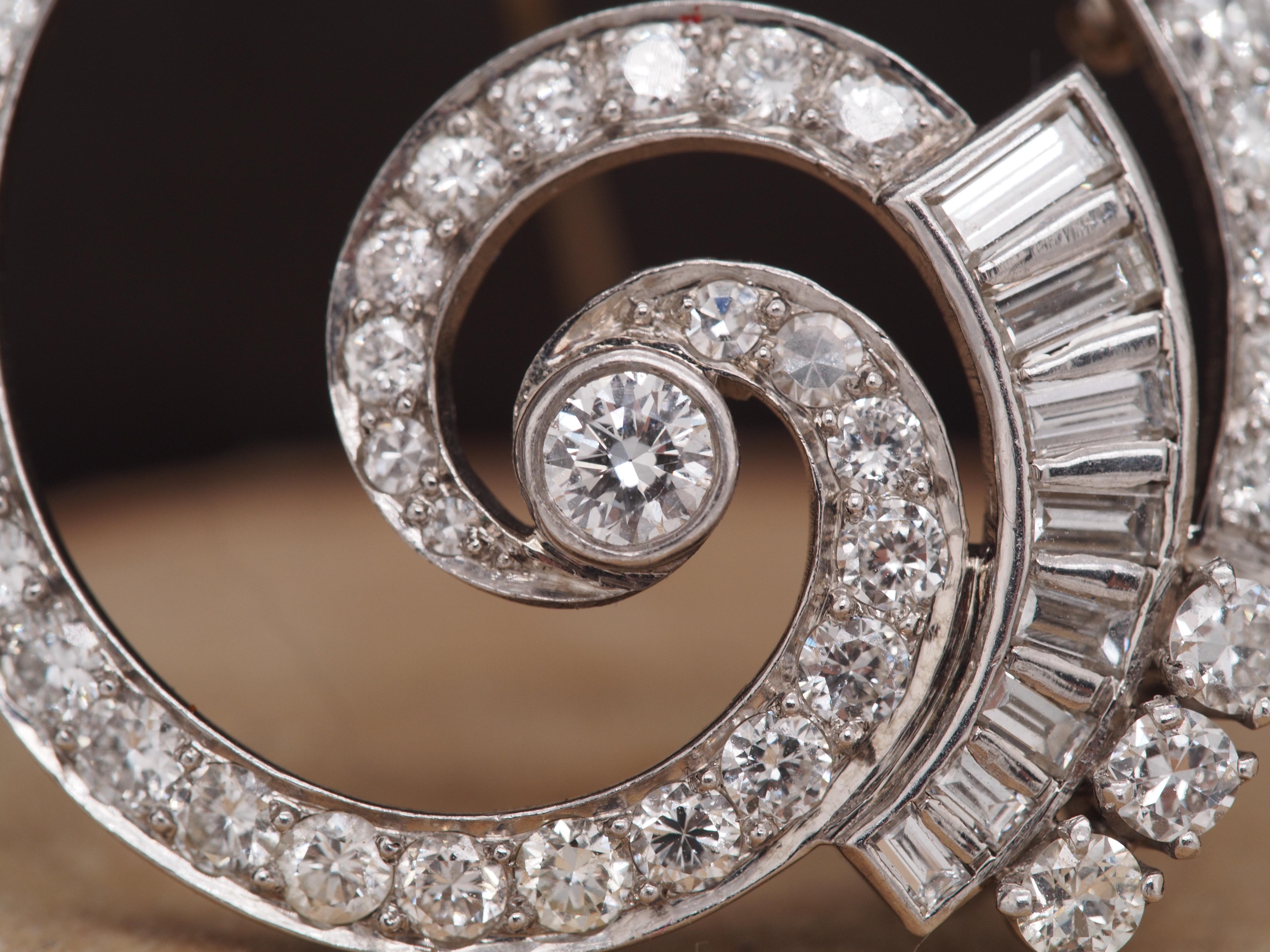 Women's Circa 1940s Platinum Art Deco Diamond Circular Swirl Brooch and Pendant For Sale