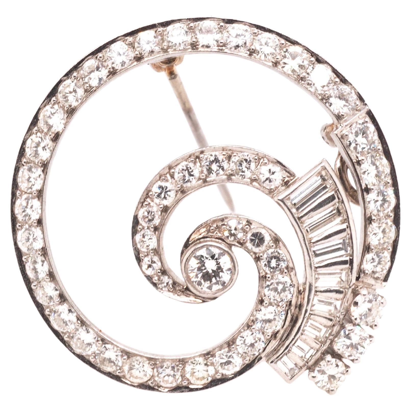 Broche circulaire tourbillonnante et pendentif Art déco en platine et diamants, années 1940