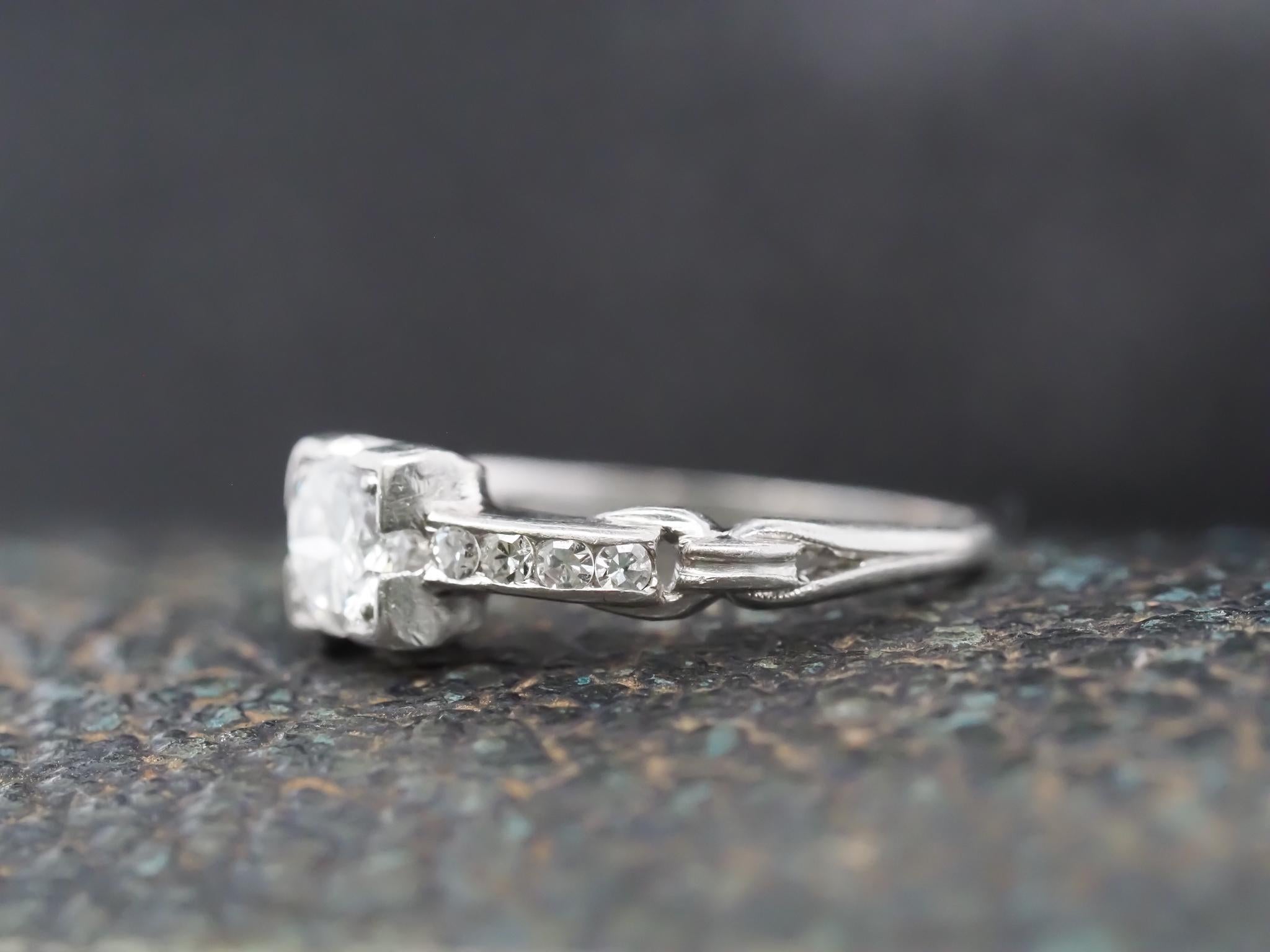 Women's Circa 1940s Platinum Art Deco Diamond Engagement Ring For Sale