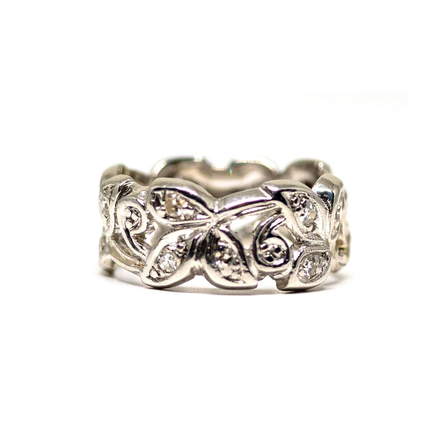 Round Cut Platinum Art Deco Floral Motif 0.52 Carat Diamond Eternity Band, circa 1940s