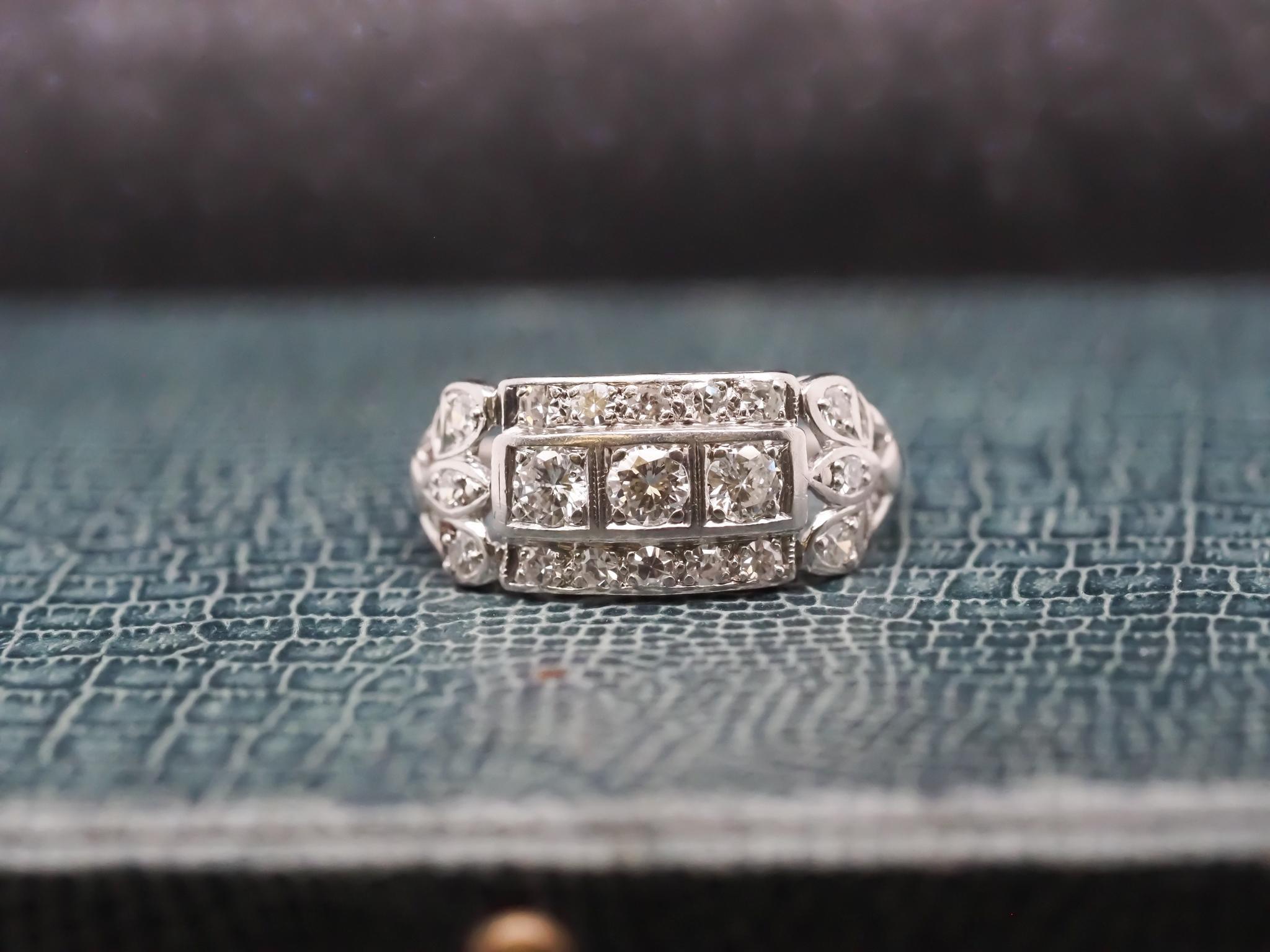 Year: 1940s

Item Details:
Ring Size: 8.5 (Sizable)
Metal Type: Platinum [Hallmarked, and Tested]
Weight: 4.4 grams

Diamond Details: .80ct total weight, F color, VS Clarity, Transitional Old Round Cut.

Band Width: 1.6mm
Condition: Excellent