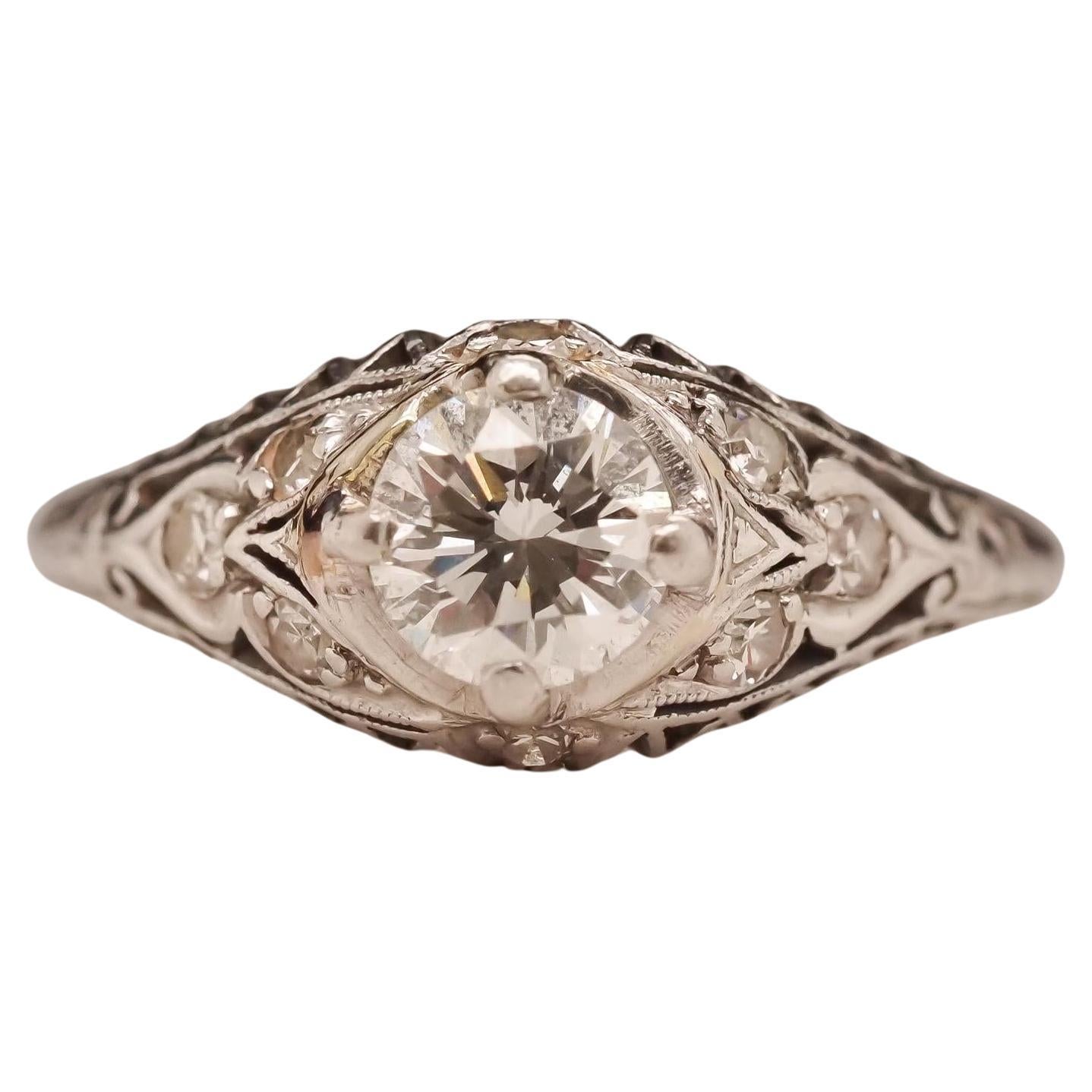 Circa 1940s Platinum Filigree .60ct Transitional Round Diamond Engagement Ring For Sale
