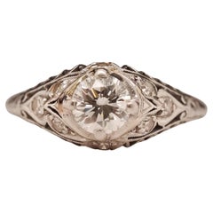 Circa 1940s Platinum Filigree .60ct Transitional Round Diamond Engagement Ring