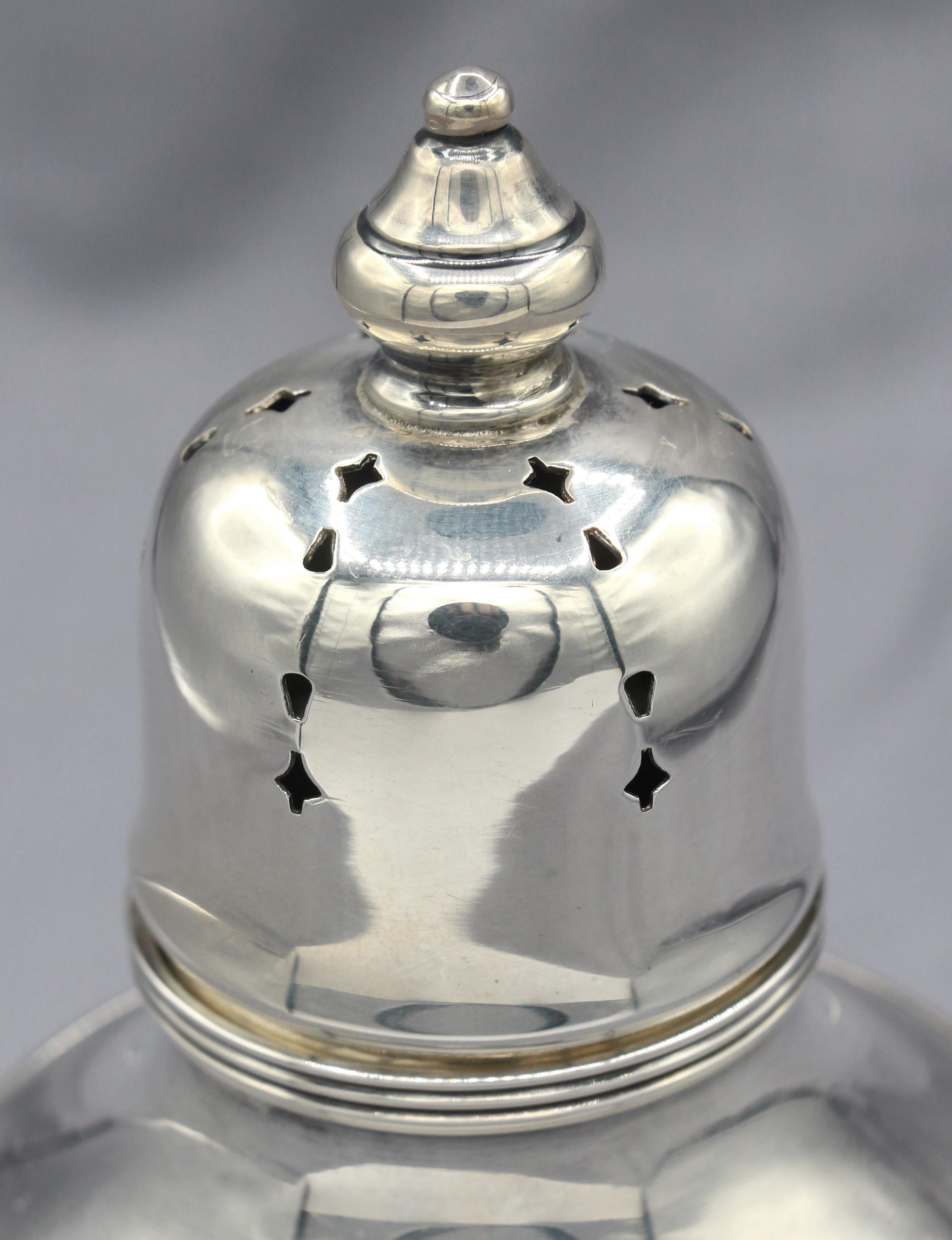 Sterling silver sugar caster by Mueck & Cary, New York City, c.1940s. Boldly classical urn form by a small NYC firm. 4.50 troy oz.
6.5