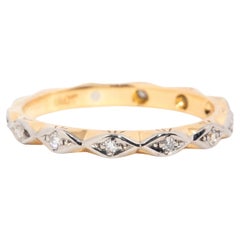 Circa 1940s Vintage 18 Carat Yellow and White Gold Diamond Eternity Band Ring