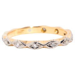 Circa 1940s Vintage 18 Carat Yellow and White Gold Diamond Eternity Band Ring