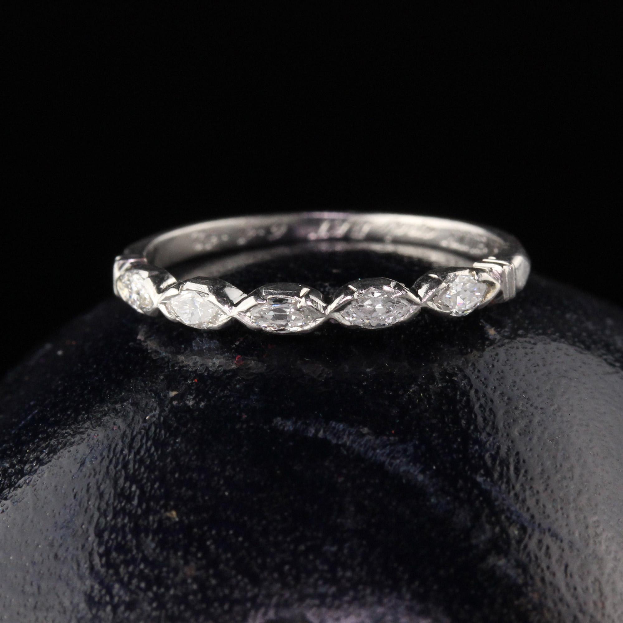 Circa 1942! Vintage Platinum half eternity band with 5 old marquise cut diamonds. 

#R0343

Metal: Platinum

Weight: 1.9 Grams

Total Diamond Weight: Approximately 0.20 cts single cut diamonds

Diamond Color: H

Diamond Clarity: SI1

Ring Size: 5