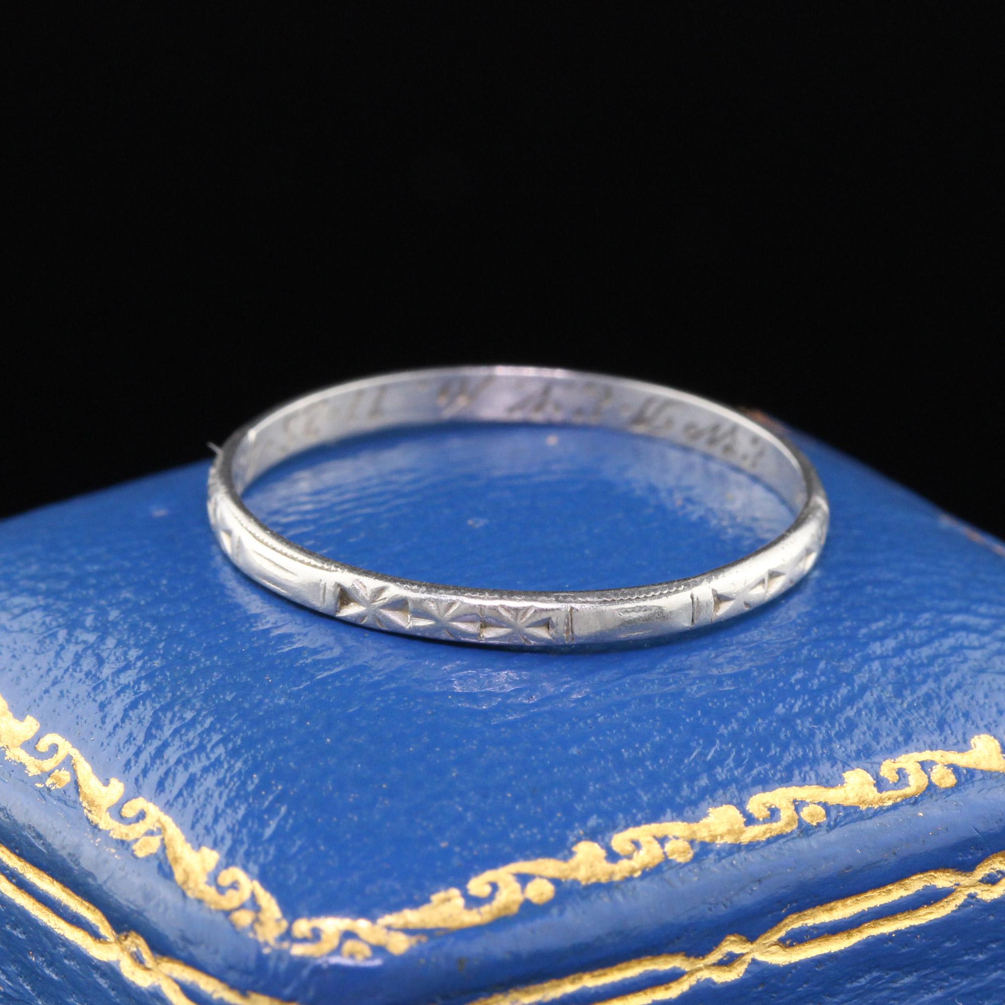 Circa 1943 - Vintage platinum wedding band with engravings all the way around.

#R0217

Metal: Platinum

Weight: 1.6 Grams

Ring Size: 8

*Unfortunately this ring cannot be sized

Measurements: 1.85 mm wide

Measurement from finger to top of ring: