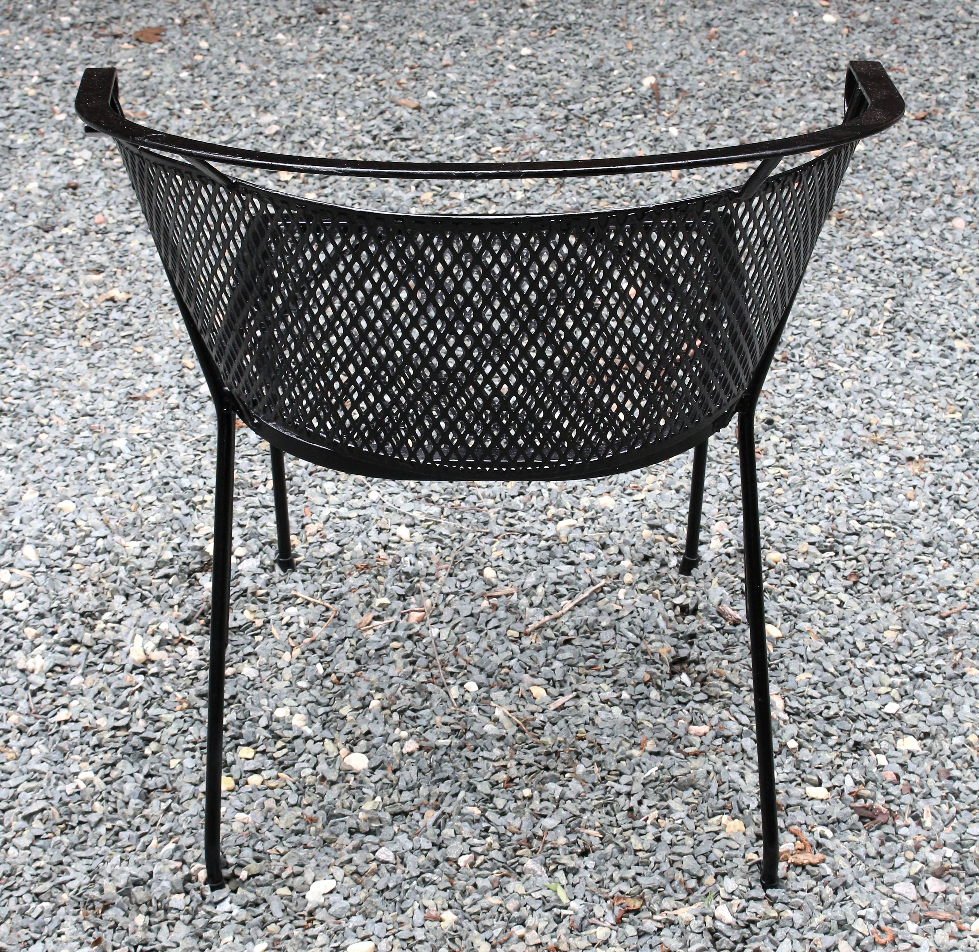 Circa 1950-70 Wrought Iron Outdoor Table & Four Arm Chairs In Good Condition In Chapel Hill, NC