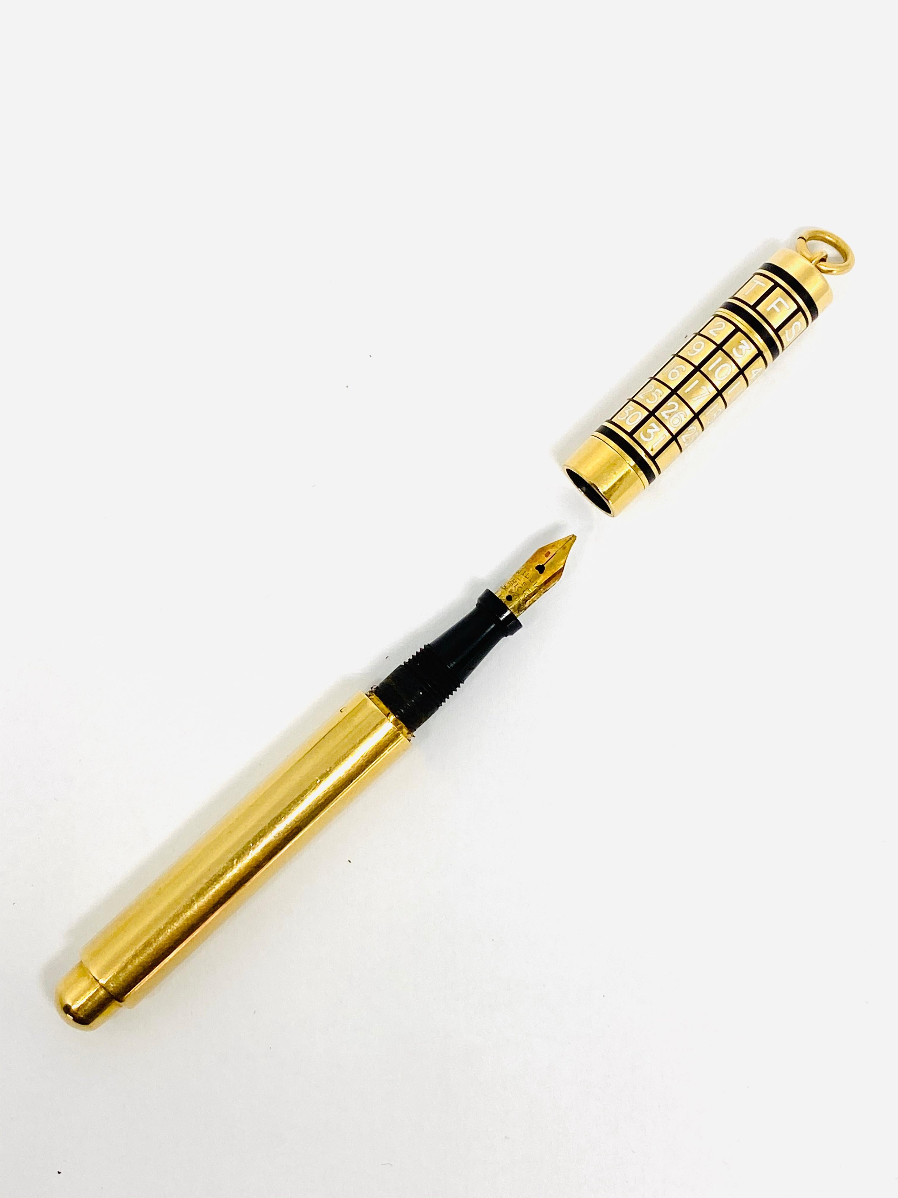 Circa 1950 CARTIER 14K Yellow Gold and Enamel Fountain Pen and Calendar Pendant

Product details:
3 in 1: fountain pain, enamel calendar and pendant
The pendant is 14K yellow gold (tested)
The pen is removable if needed and the ink can be