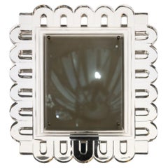 Circa 1950, cristallo Lalique, cornice decorata con volute.