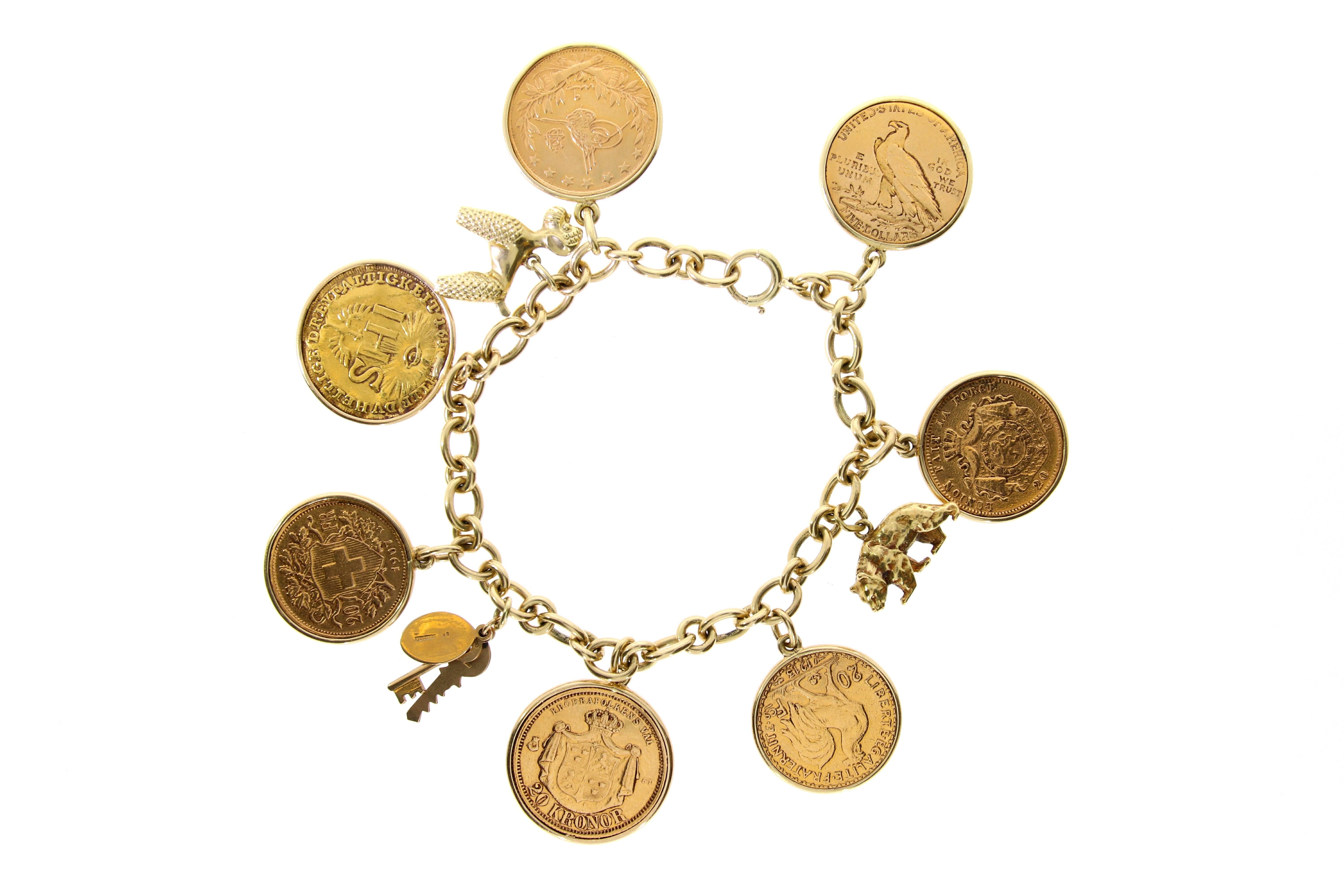 Victorian Yellow Gold Coins and Charmes Bracelet, circa 1950 For Sale