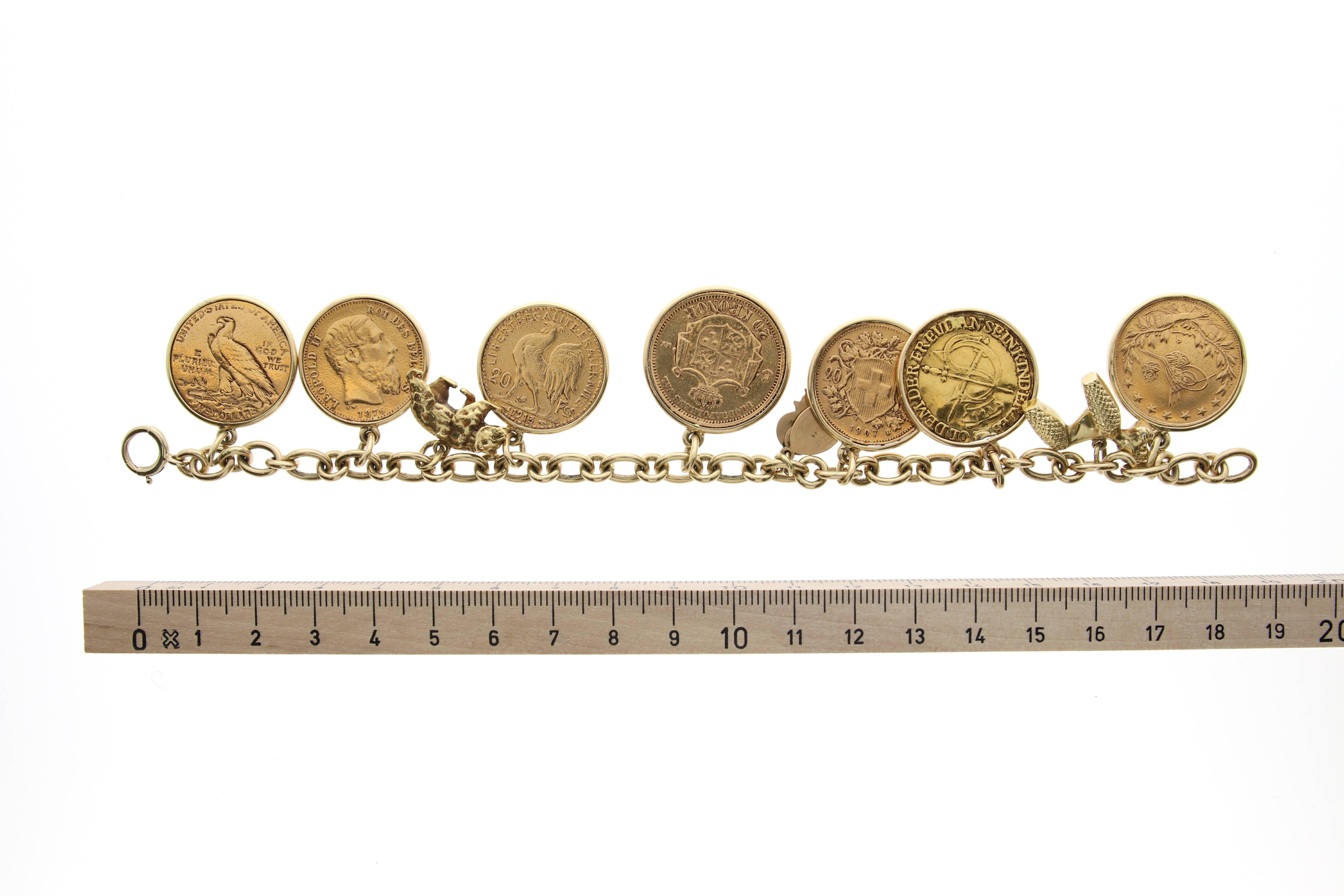 Yellow Gold Coins and Charmes Bracelet, circa 1950 In Excellent Condition For Sale In Munich, DE