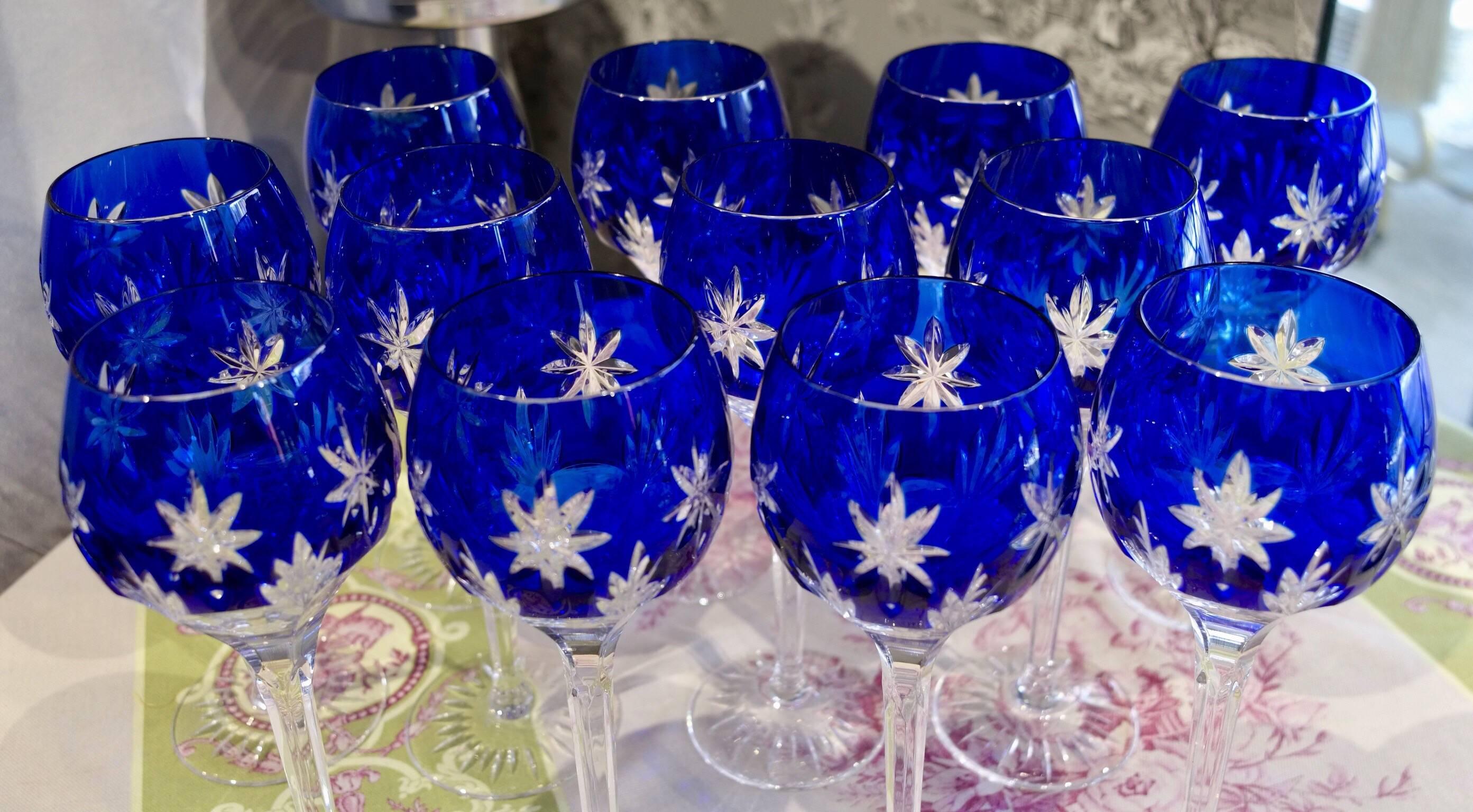20th Century Blue Crystal Engraved Service, One Carafe and 12 Stemmed Glasses, circa 1950