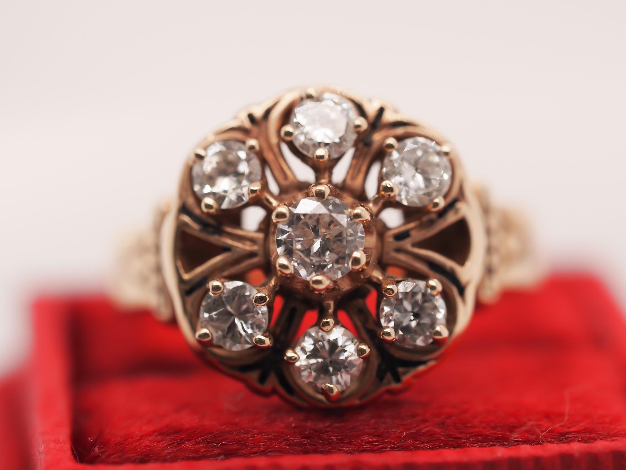 Year: 1950s
Item Details:
Ring Size: 10 (Sizable)
Metal Type: 14k yellow gold [Hallmarked, and Tested]
Weight: 6 grams
Diamond Details: .80ct total weight, antique transitional cut, G Color, SI2 clarity
Band Width: 2.75mm
Condition: Excellent
Vintage