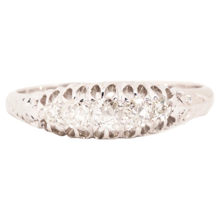 Circa 1950s 18 Carat White Gold Old Cut Diamond Five Stone Vintage Ring For Sale