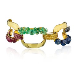 Bracciale con tre pietre preziose in oro giallo 18 carati, circa anni '50