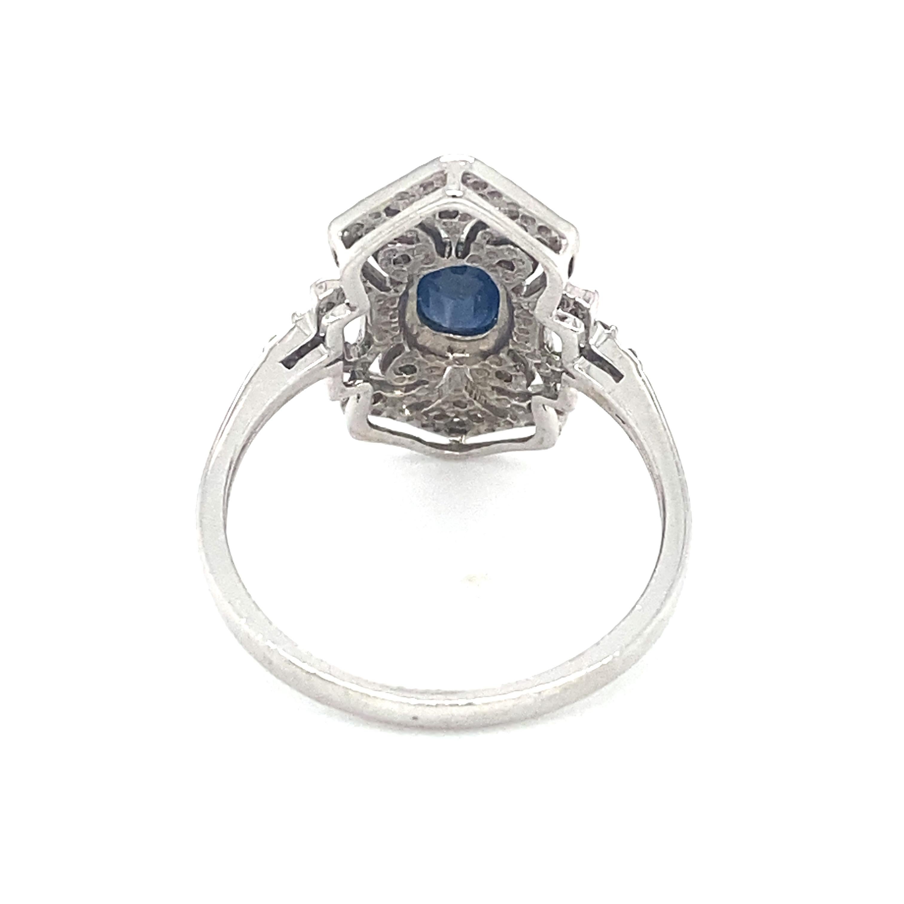 Item Details: This vintage ring has an Art Deco geometric style with a center sapphire and accent diamonds.

Circa: 1950s
Metal Type: 14k white gold
Weight: 3.8g
Size: US 8, resizable

Diamond Details:

Carat: 0.20 carat total weight
Shape: