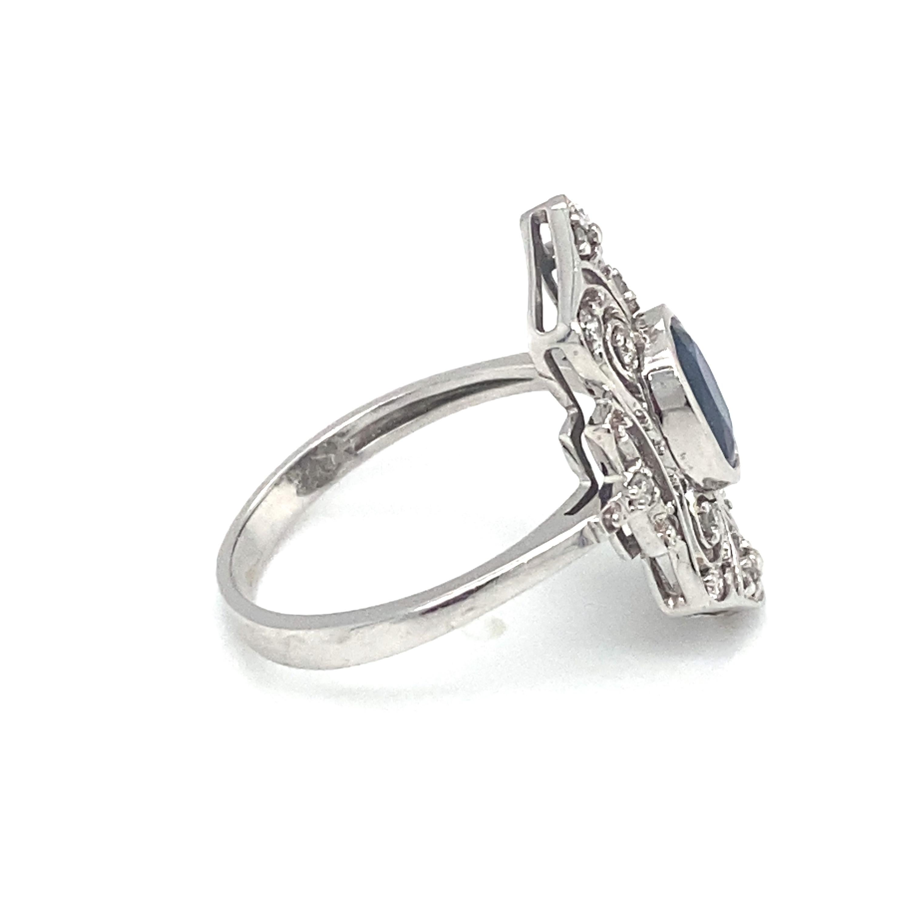 Women's or Men's Circa 1950s Art Deco Style Sapphire and Diamond Cocktail Ring in 14K White Gold For Sale