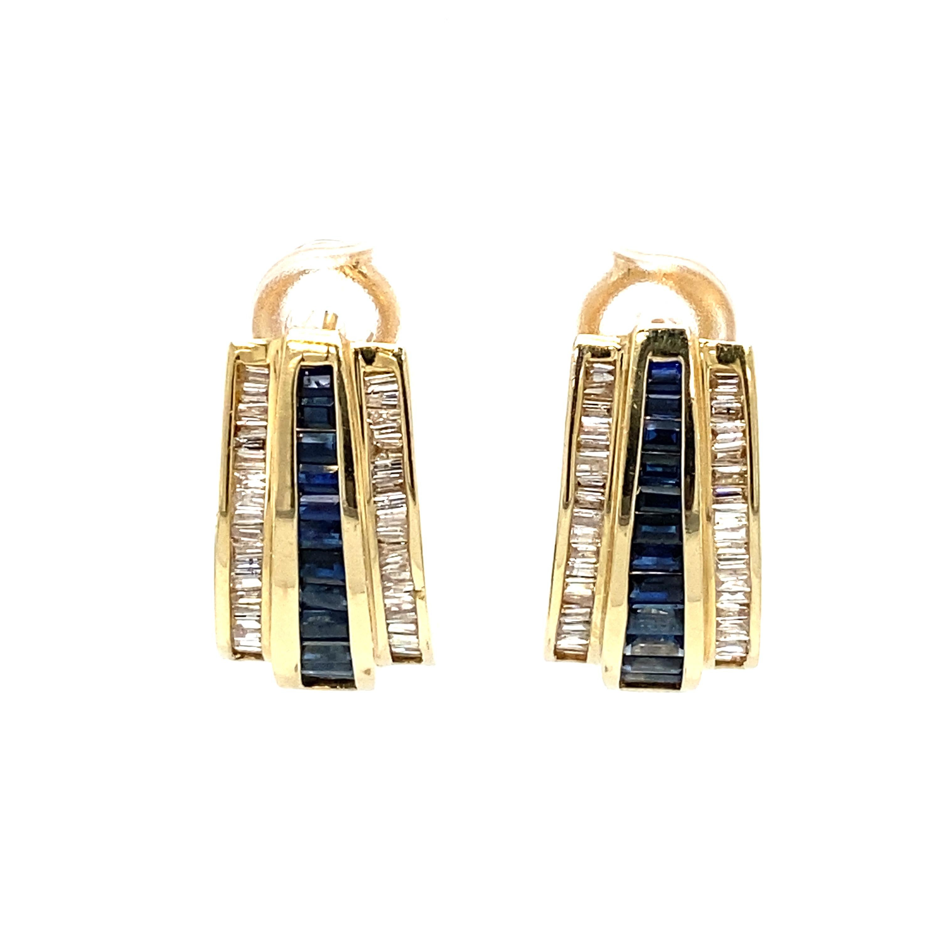 Item Details: These 1950s earrings have baguette blue sapphires and diamonds in a channel set design. They are pierced earrings and have omega clips. 

Circa: 1950s
Metal Type: 14k yellow gold
Weight: 12.3 grams
Size: 1.0 in Length

Diamond