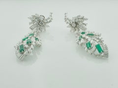 Circa 1950's Dangling Diamond and Emerald Earrings in Platinum