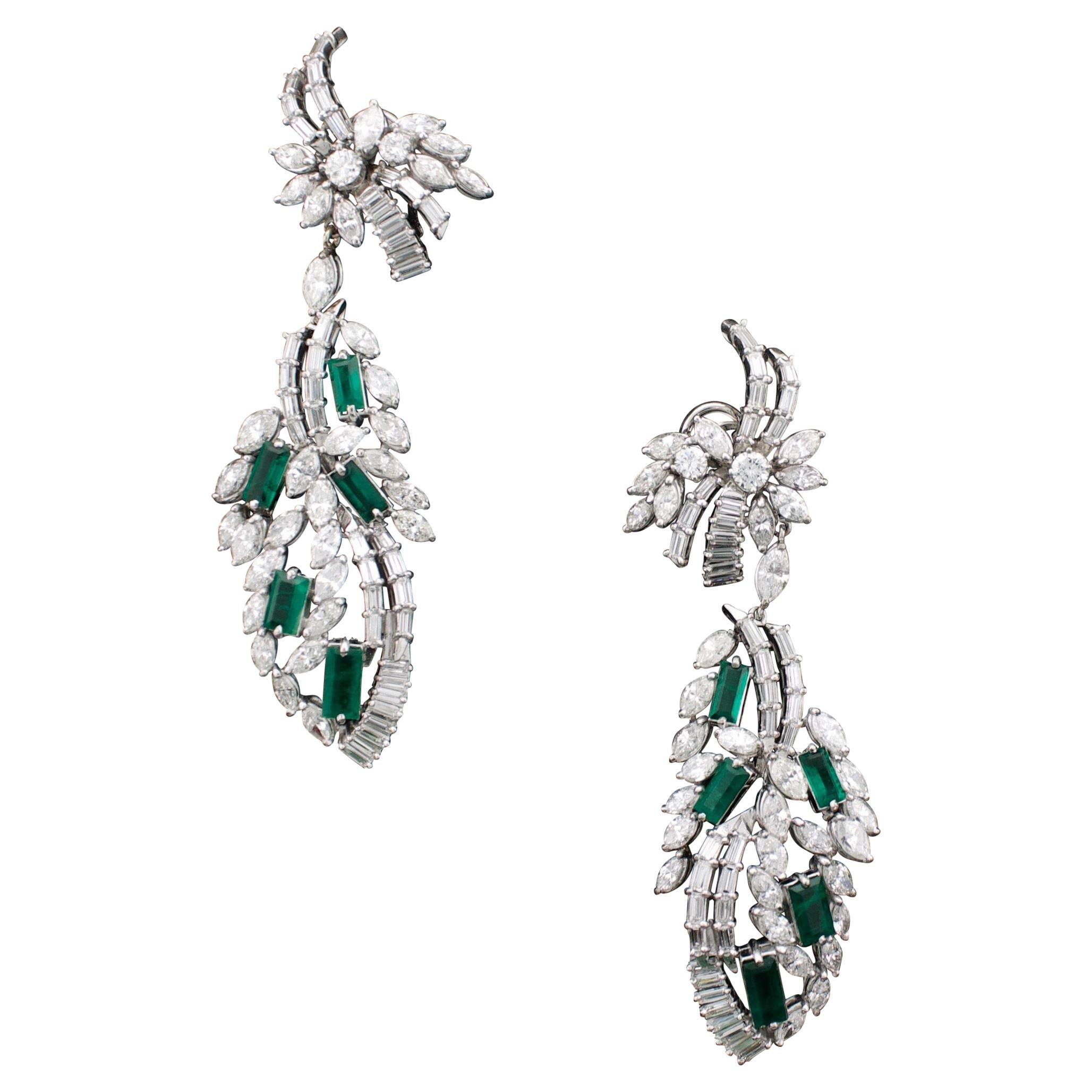 Circa 1950's Dangling Diamond and Emerald Earrings in Platinum For Sale