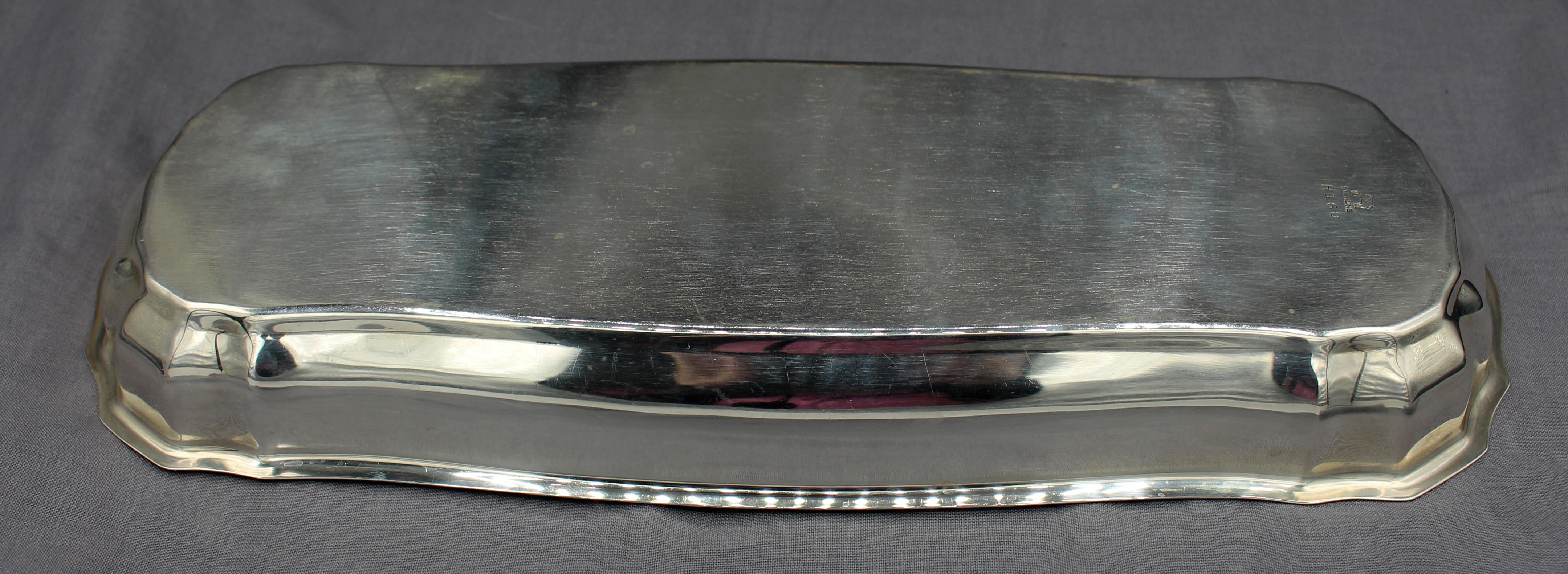 Circa 1950s sterling silver bread tray by Ellmore Silver Co. Chippendale shape. 8.85 troy oz. Estate of Linda Kornberg.
11 3/4