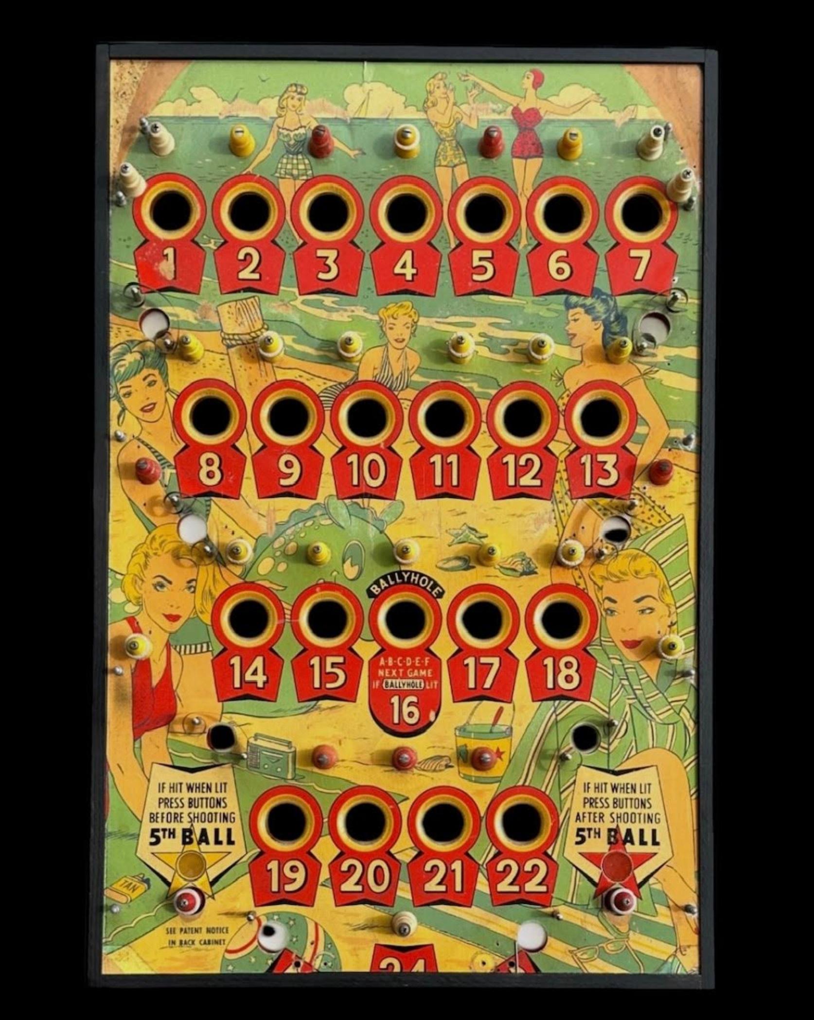 Circa 1950's framed pinball game playing field top. From an old light up, stand up coin operated pinball game. Great graphics with playful beach scene. Works great in multiple settings from dens and bedrooms to vacation homes. Easy to hang with a
