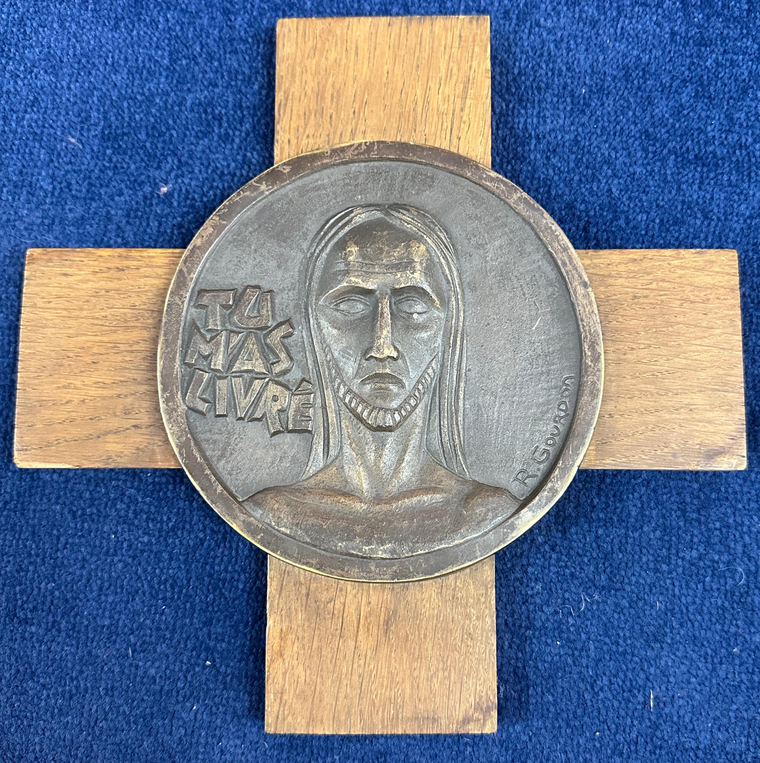 Circa 1950s Art Deco style bronze circular plaques depicting scenes from the day of Jesus Christ's crucifixion by René Gourdon (1910-1992), renowned French sculptor and artist.  Eleven plaques show his initials, RG, one shows his full name R.