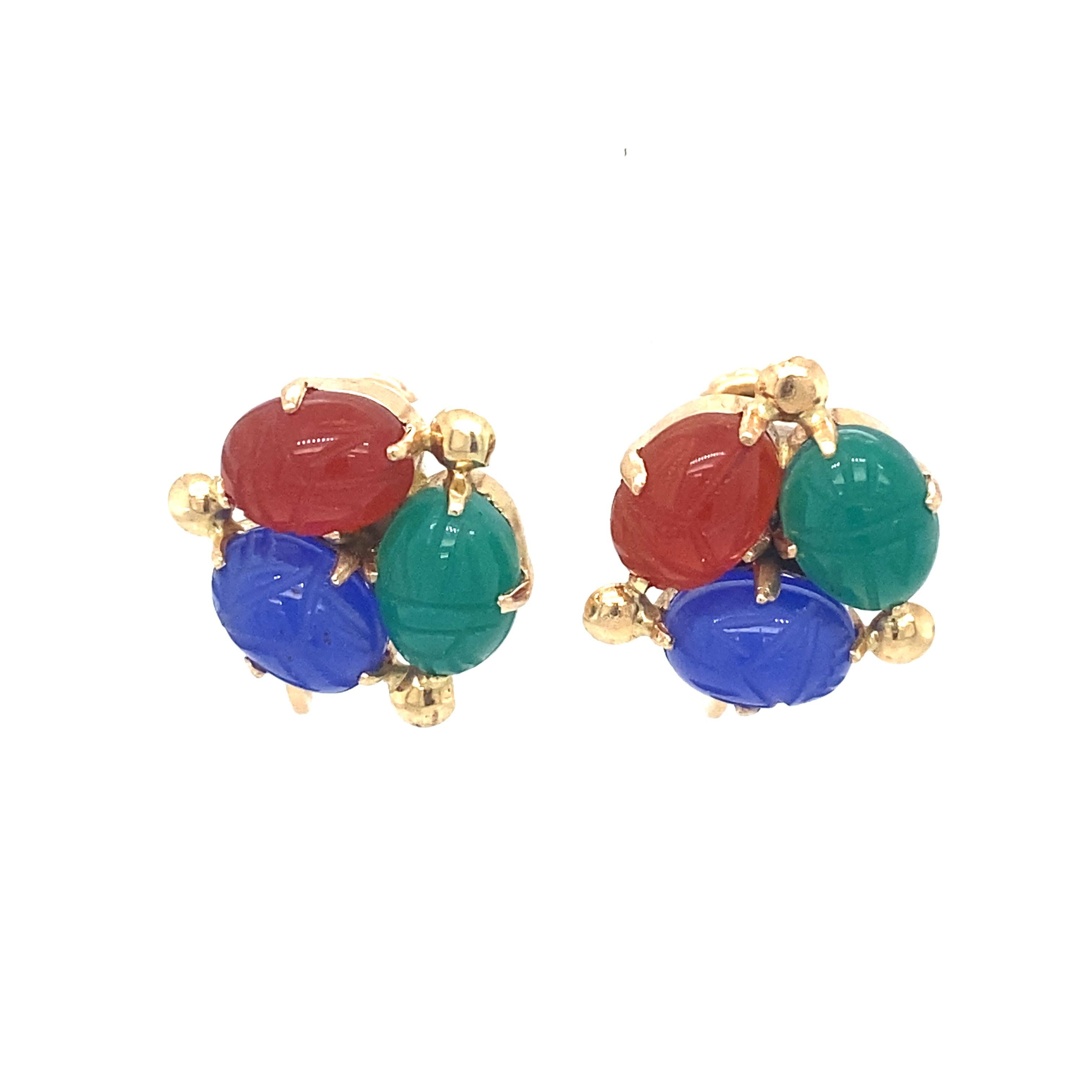 Item Details: These earrings have screw backs and feature larnet, lapis lazuli and chalcedony gemstones carved into scarabs.

Circa: 1950s
Metal Type: 14 Karat Yellow Gold
Weight: 5.3 grams