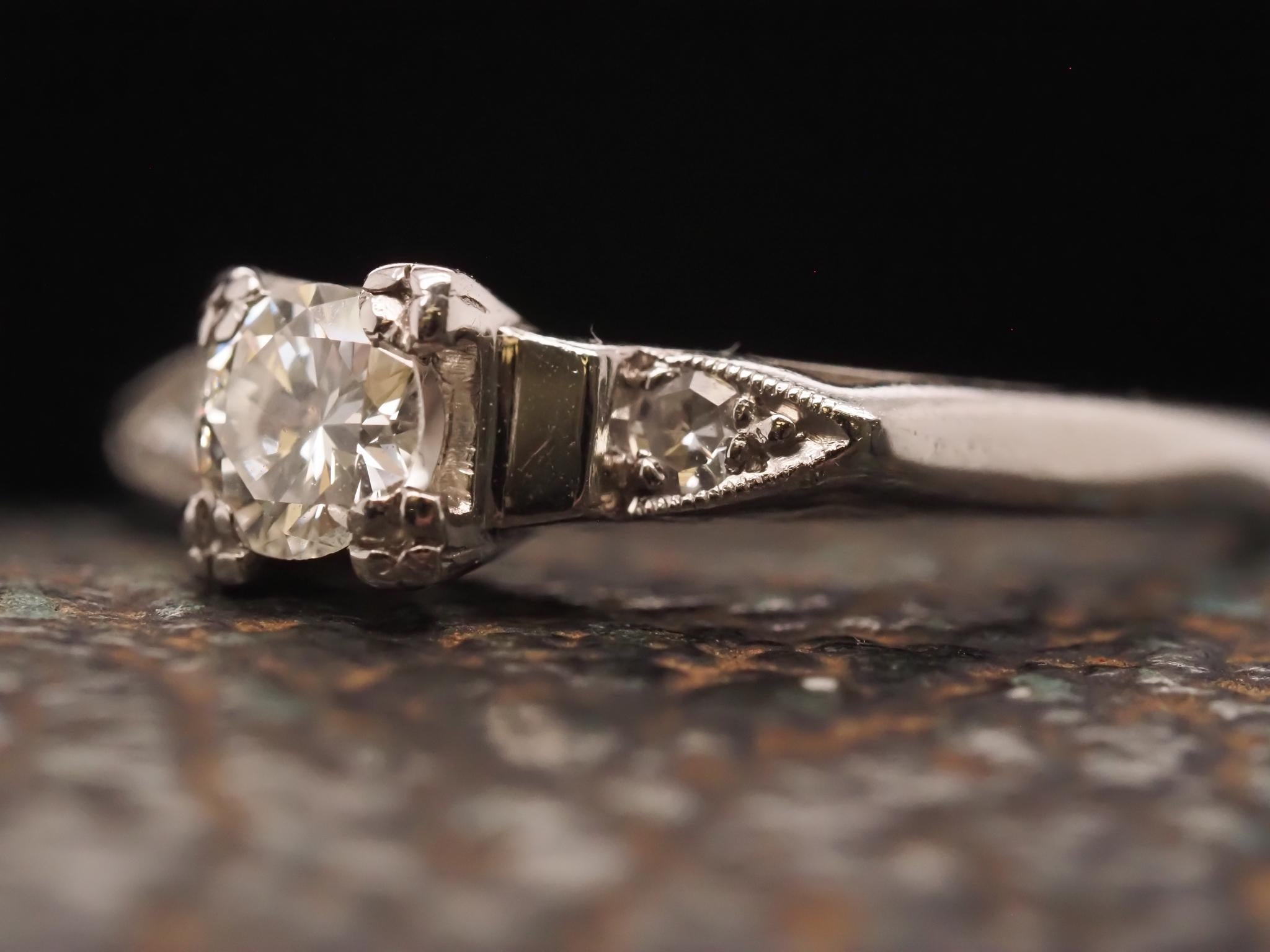 Women's Circa 1950s Platinum .35ct Transitional European Cut Diamond Engagement Ring For Sale